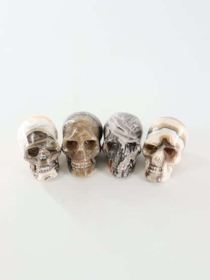 Small Onyx Skulls Set of 4 - Expert Wholesale and Supplier of Wholesale Crystals & Bulk Gemstones, []