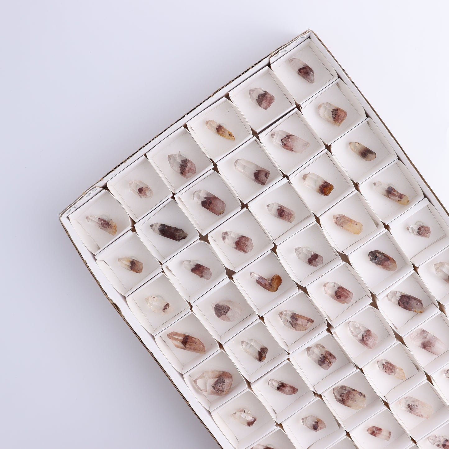 Hematite Phantom in Quartz Points Set of 54 - Expert Wholesale and Supplier of Wholesale Crystals & Bulk Gemstones, ["Hematite","Hematite Phantom","Quartz"]