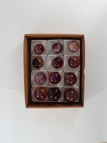 Fluorite Spheres Set of 12 - Expert Wholesale and Supplier of Wholesale Crystals & Bulk Gemstones, []