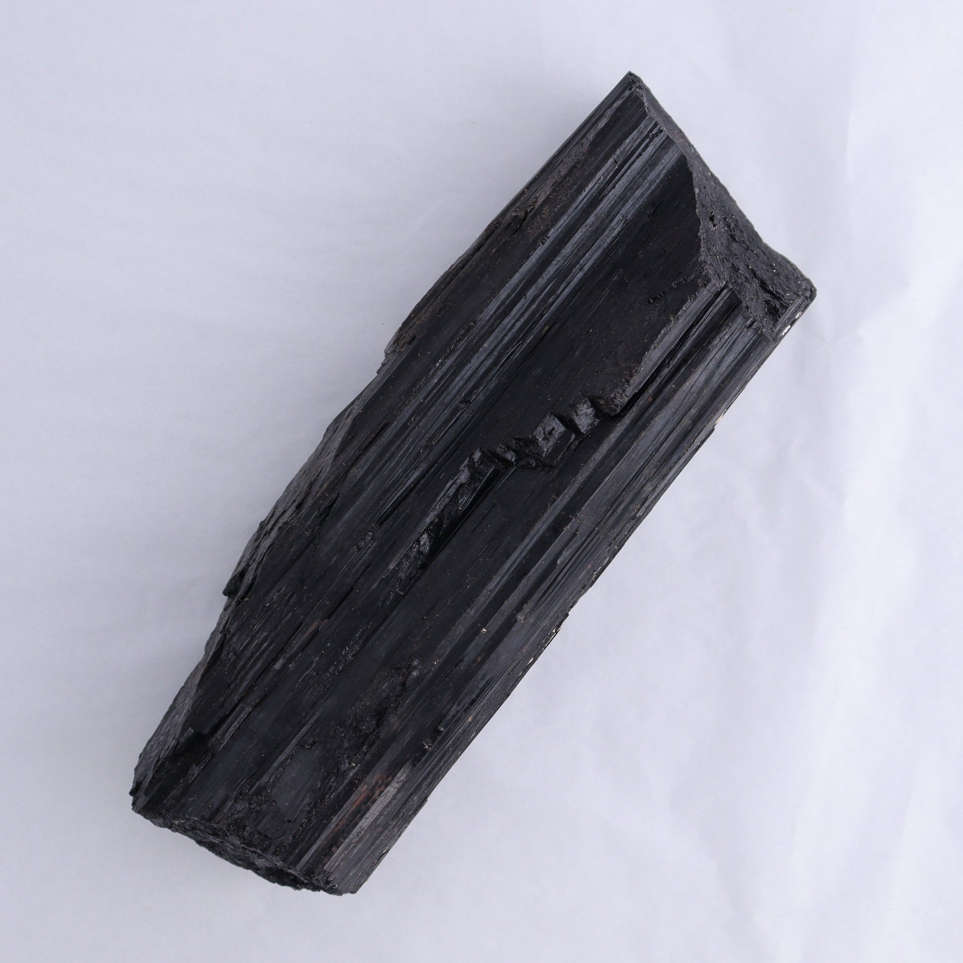 Black Tourmaline Log - Expert Wholesale and Supplier of Wholesale Crystals & Bulk Gemstones, ["Black Tourmaline","logs","Madagascar","Rough","Tourmaline"]