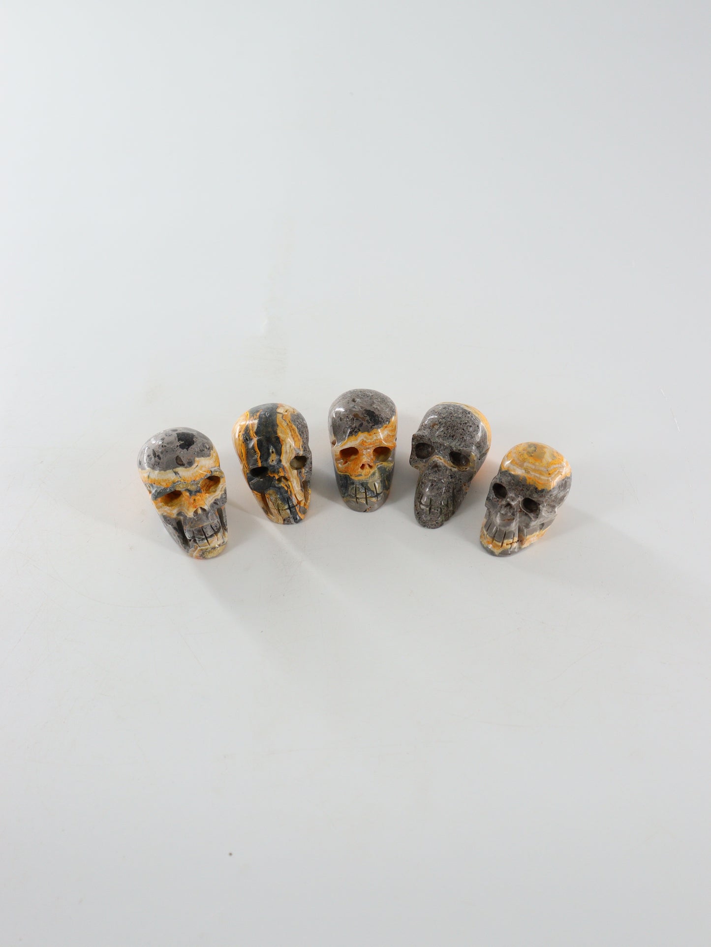 Bumblebee Jasper Skulls Set of 5 - Expert Wholesale and Supplier of Wholesale Crystals & Bulk Gemstones, []