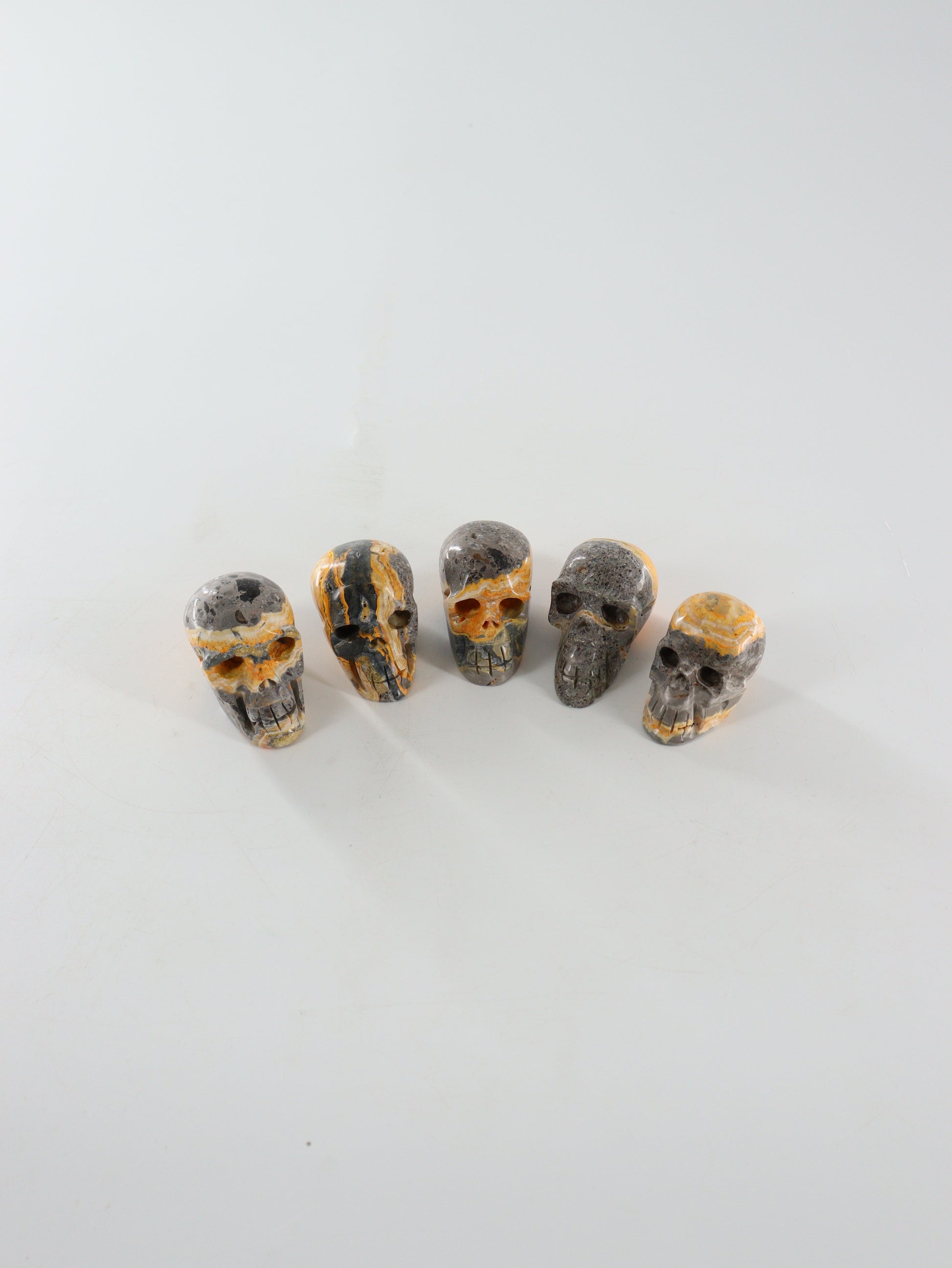 Bumblebee Jasper Skulls Set of 5 - Expert Wholesale and Supplier of Wholesale Crystals & Bulk Gemstones, []