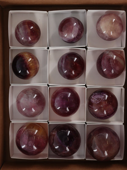 Fluorite Spheres Set of 12 - Expert Wholesale and Supplier of Wholesale Crystals & Bulk Gemstones, []