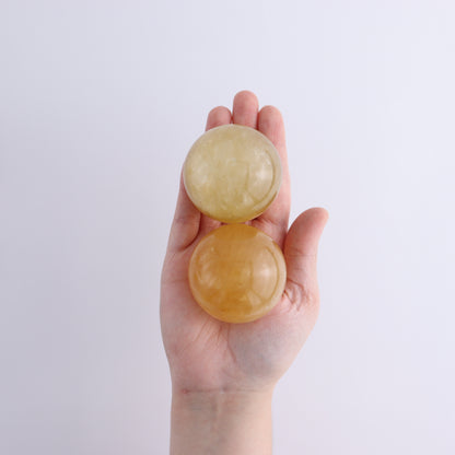 Honey Calcite Spheres Set of 12 - Expert Wholesale and Supplier of Wholesale Crystals & Bulk Gemstones, ["Calcite","Honey Calcite","Mexico","Spheres"]