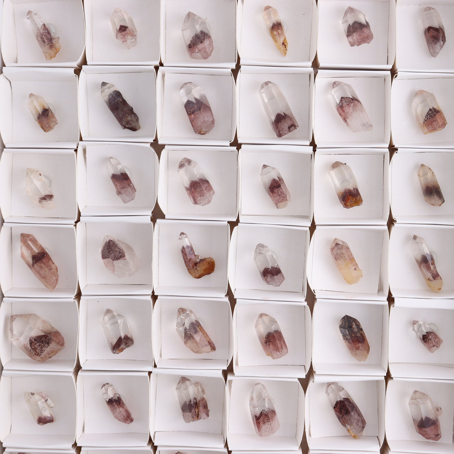 Hematite Phantom in Quartz Points Set of 54 - Expert Wholesale and Supplier of Wholesale Crystals & Bulk Gemstones, ["Hematite","Hematite Phantom","Quartz"]