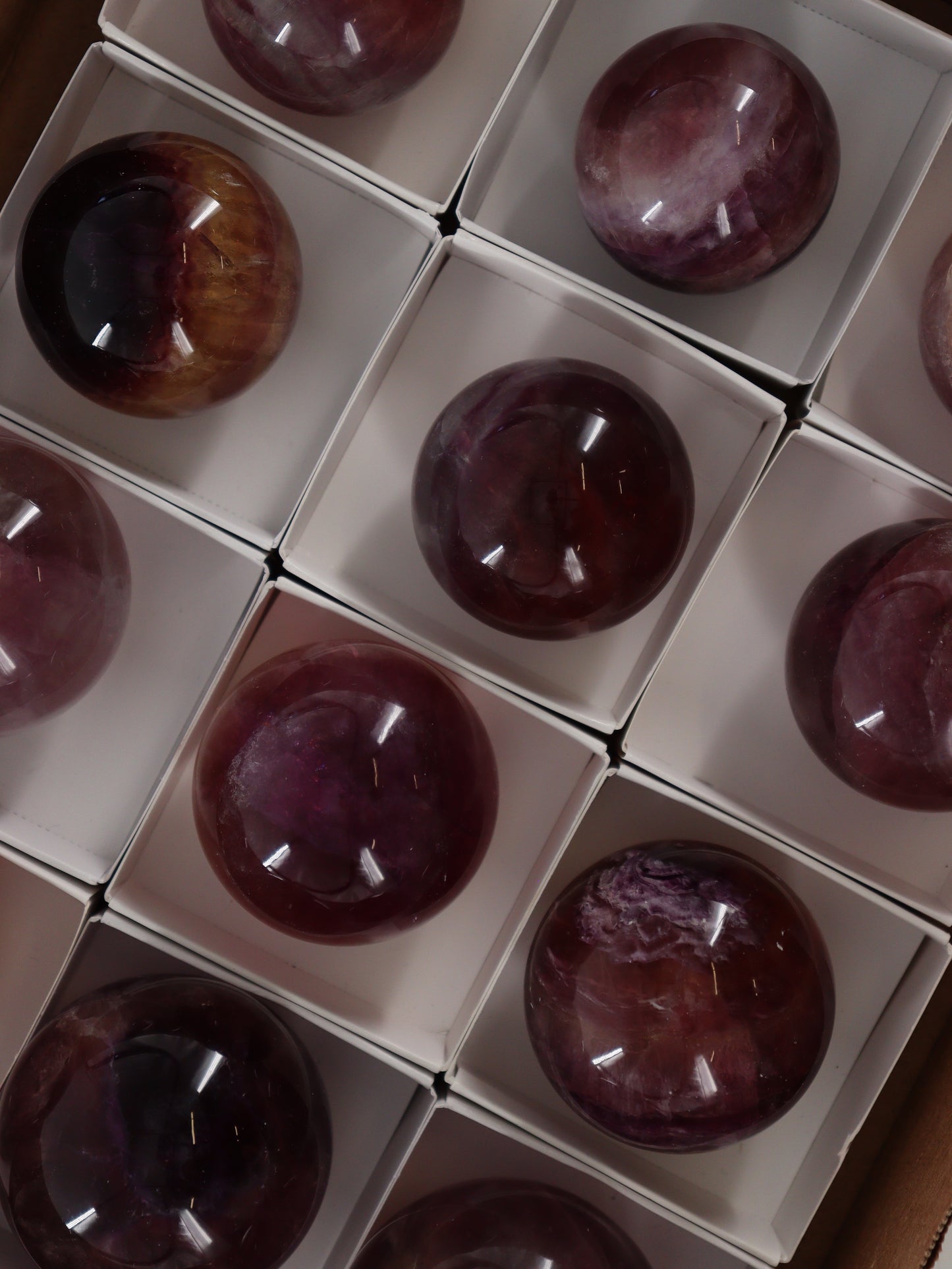 Fluorite Spheres Set of 12 - Expert Wholesale and Supplier of Wholesale Crystals & Bulk Gemstones, []