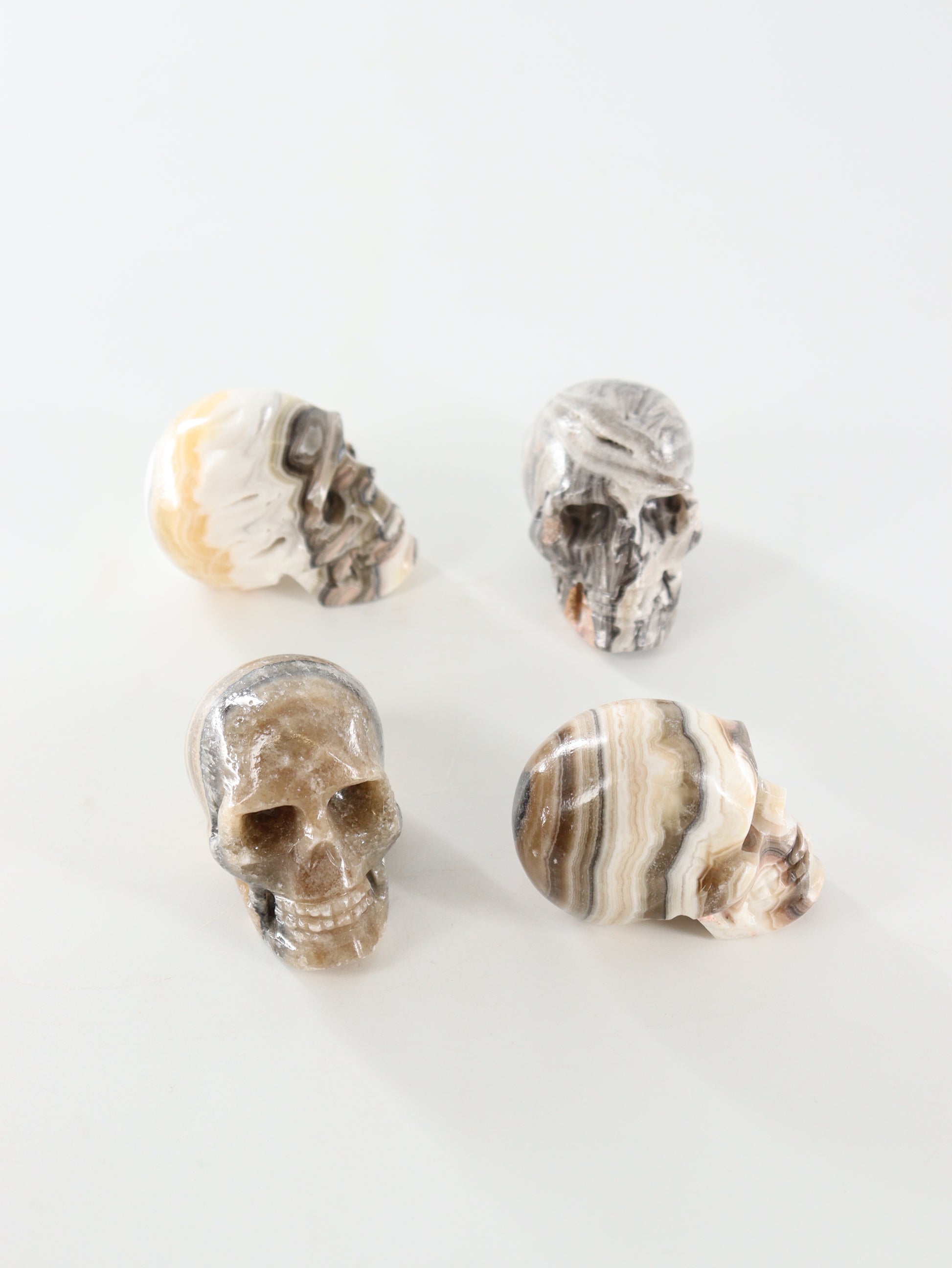 Small Onyx Skulls Set of 4 - Expert Wholesale and Supplier of Wholesale Crystals & Bulk Gemstones, []