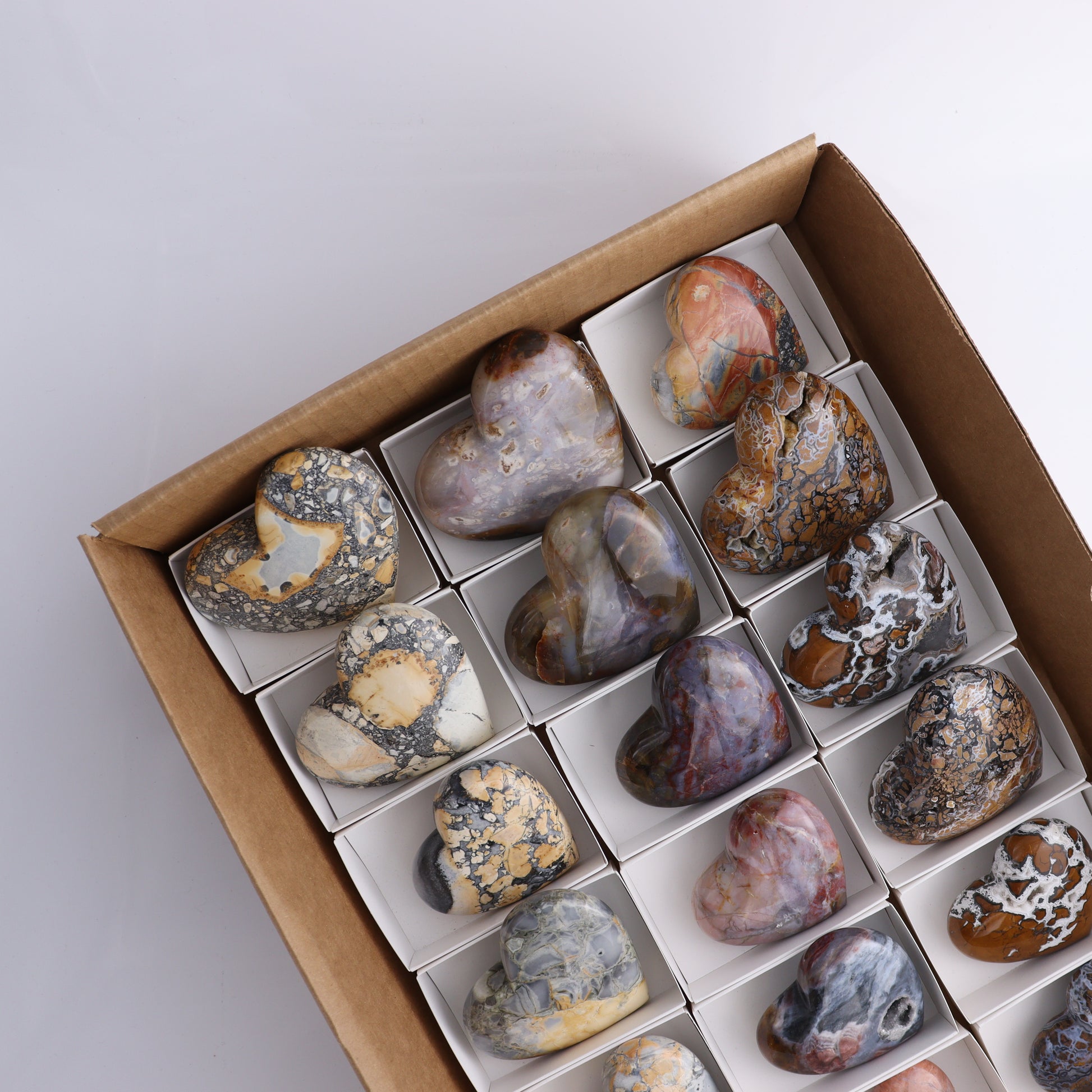 Polished Indonesian  Hearts Mixed Flat of 18 - Expert Wholesale and Supplier of Wholesale Crystals & Bulk Gemstones, ["Brecciated Jasper","close_50","Hearts","Indonesia","Maligno Jasper","River Jasper"]