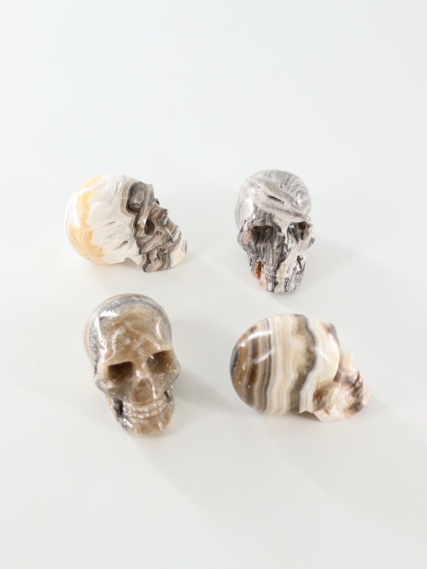 Small Onyx Skulls Set of 4 - Expert Wholesale and Supplier of Wholesale Crystals & Bulk Gemstones, []