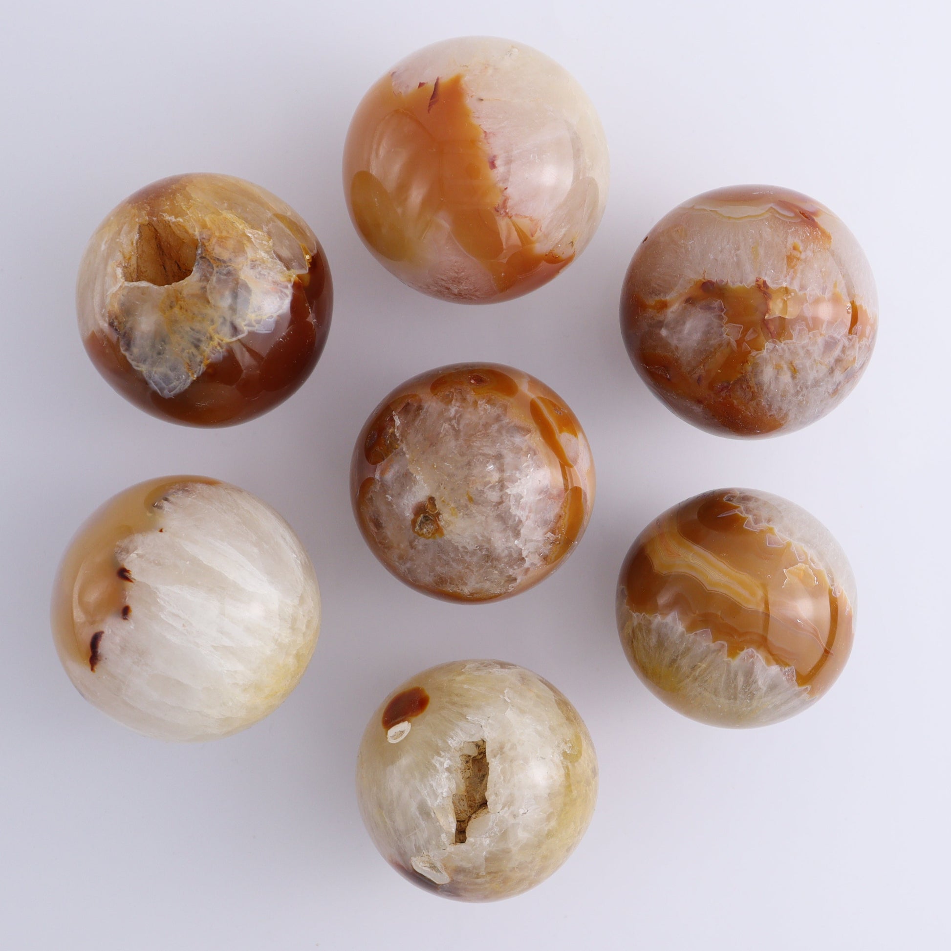 Carnelian Spheres Set of 7 - Expert Wholesale and Supplier of Wholesale Crystals & Bulk Gemstones, ["carnelian","Madagascar","Spheres"]