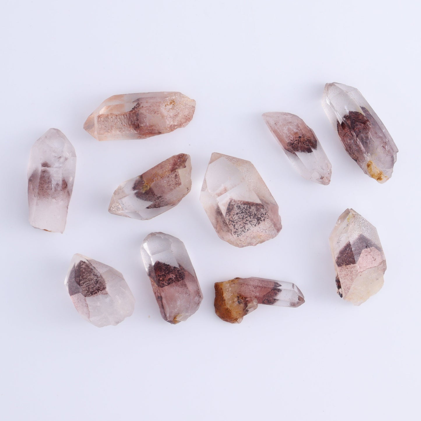 Hematite Phantom in Quartz Points Set of 54 - Expert Wholesale and Supplier of Wholesale Crystals & Bulk Gemstones, ["Hematite","Hematite Phantom","Quartz"]