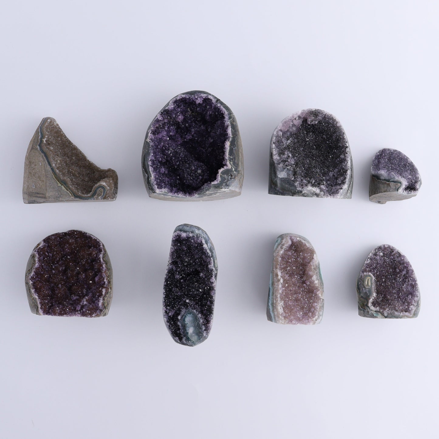 Uruguay Amethyst Cut Base Set of 8 - Expert Wholesale and Supplier of Wholesale Crystals & Bulk Gemstones, ["Amethyst","Cut Base","Uruguay"]