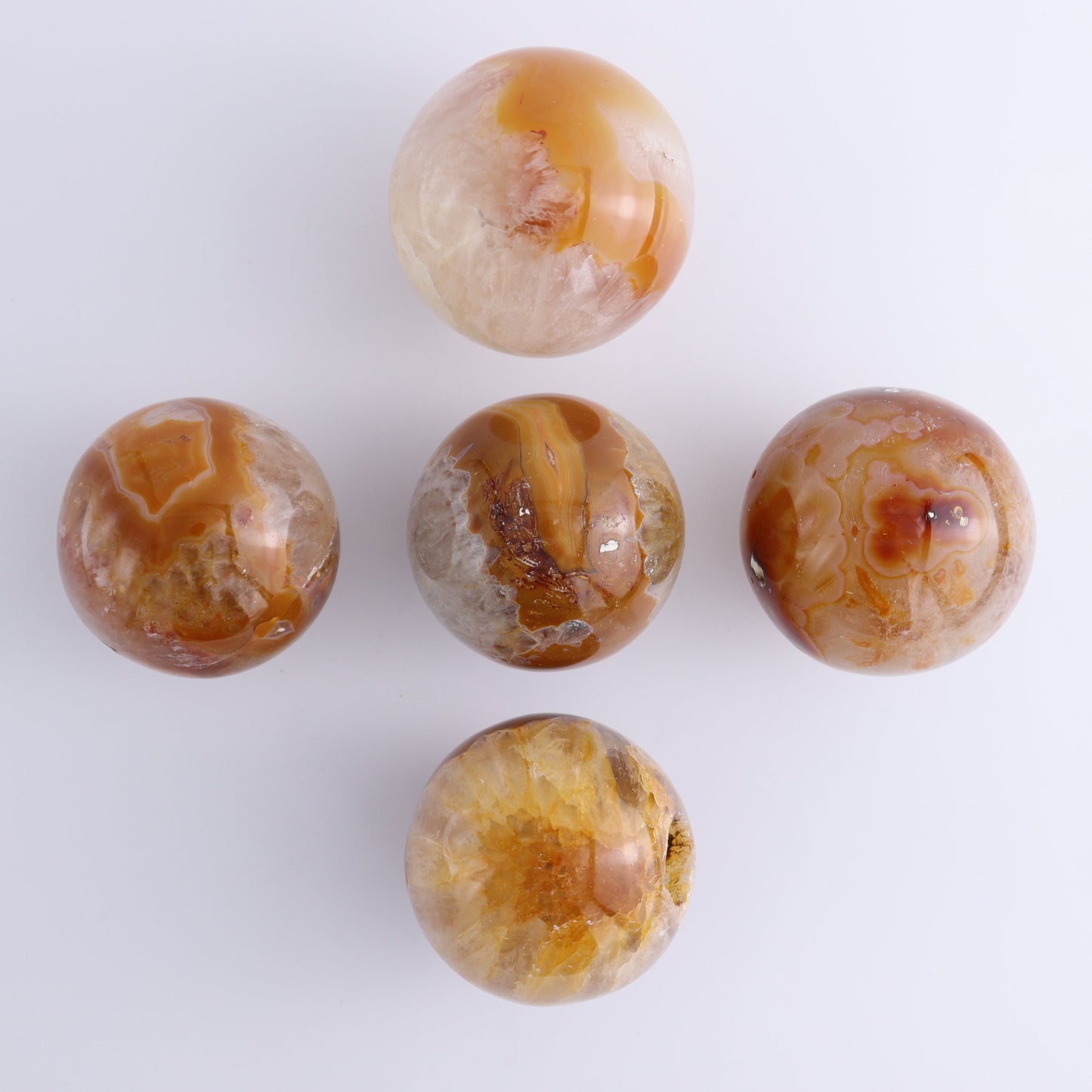 Carnelian Spheres Set of 7 - Expert Wholesale and Supplier of Wholesale Crystals & Bulk Gemstones, ["carnelian","Madagascar","Spheres"]