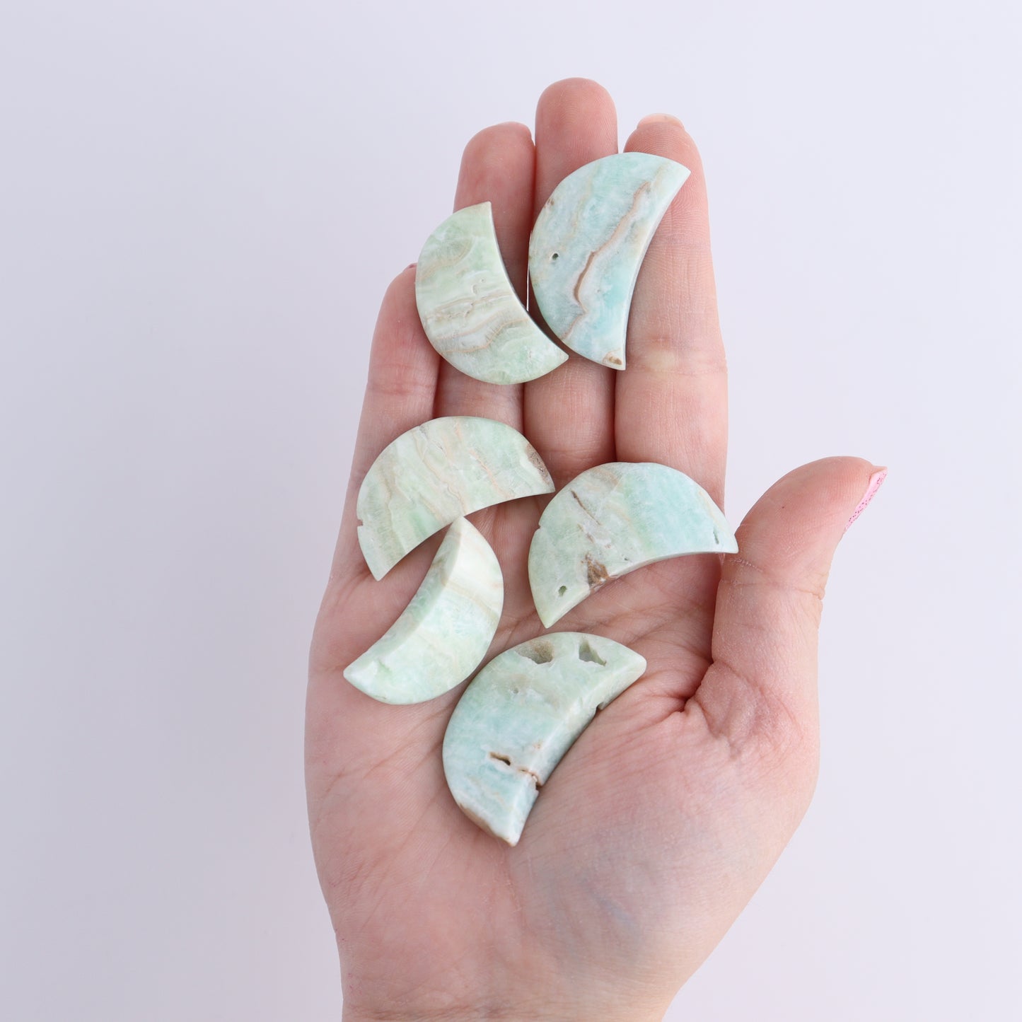 One Caribbean Calcite Little Moon - Expert Wholesale and Supplier of Wholesale Crystals & Bulk Gemstones, ["Calcite","Caribbean Calcite","moons","Pakistan"]