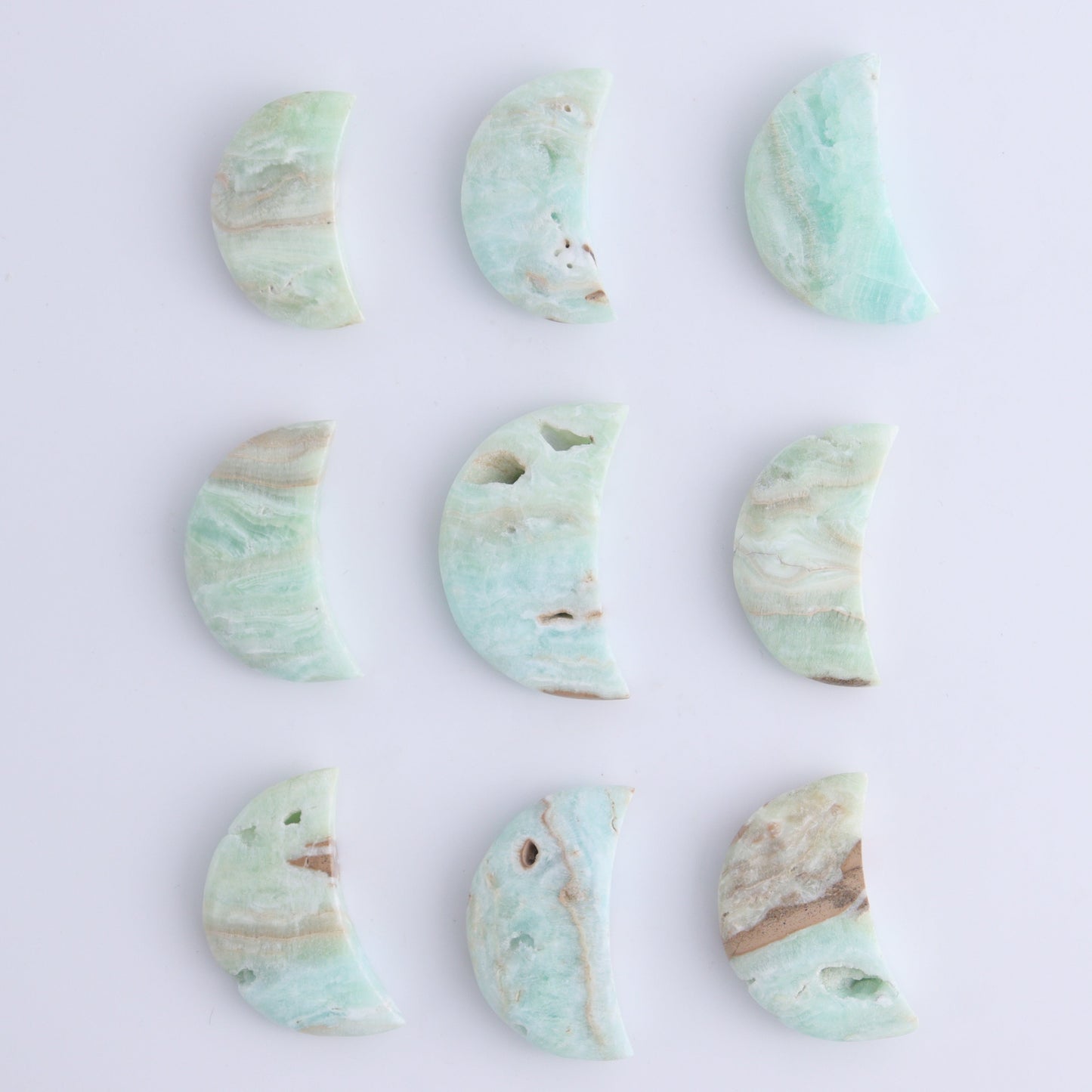 One Caribbean Calcite Little Moon - Expert Wholesale and Supplier of Wholesale Crystals & Bulk Gemstones, ["Calcite","Caribbean Calcite","moons","Pakistan"]