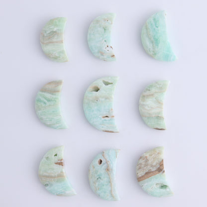 One Caribbean Calcite Little Moon - Expert Wholesale and Supplier of Wholesale Crystals & Bulk Gemstones, ["Calcite","Caribbean Calcite","moons","Pakistan"]