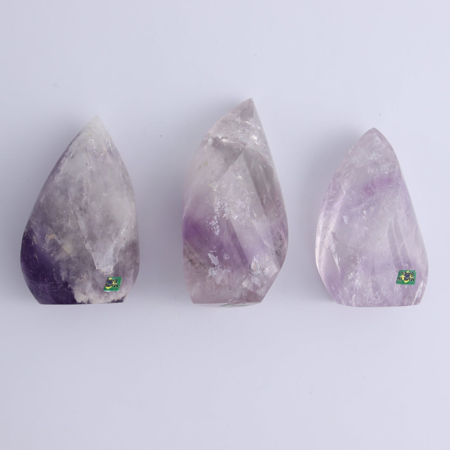 Imperfect Amethyst Flames Set of 9 - Expert Wholesale and Supplier of Wholesale Crystals & Bulk Gemstones, ["Amethyst","Brazil","flames"]