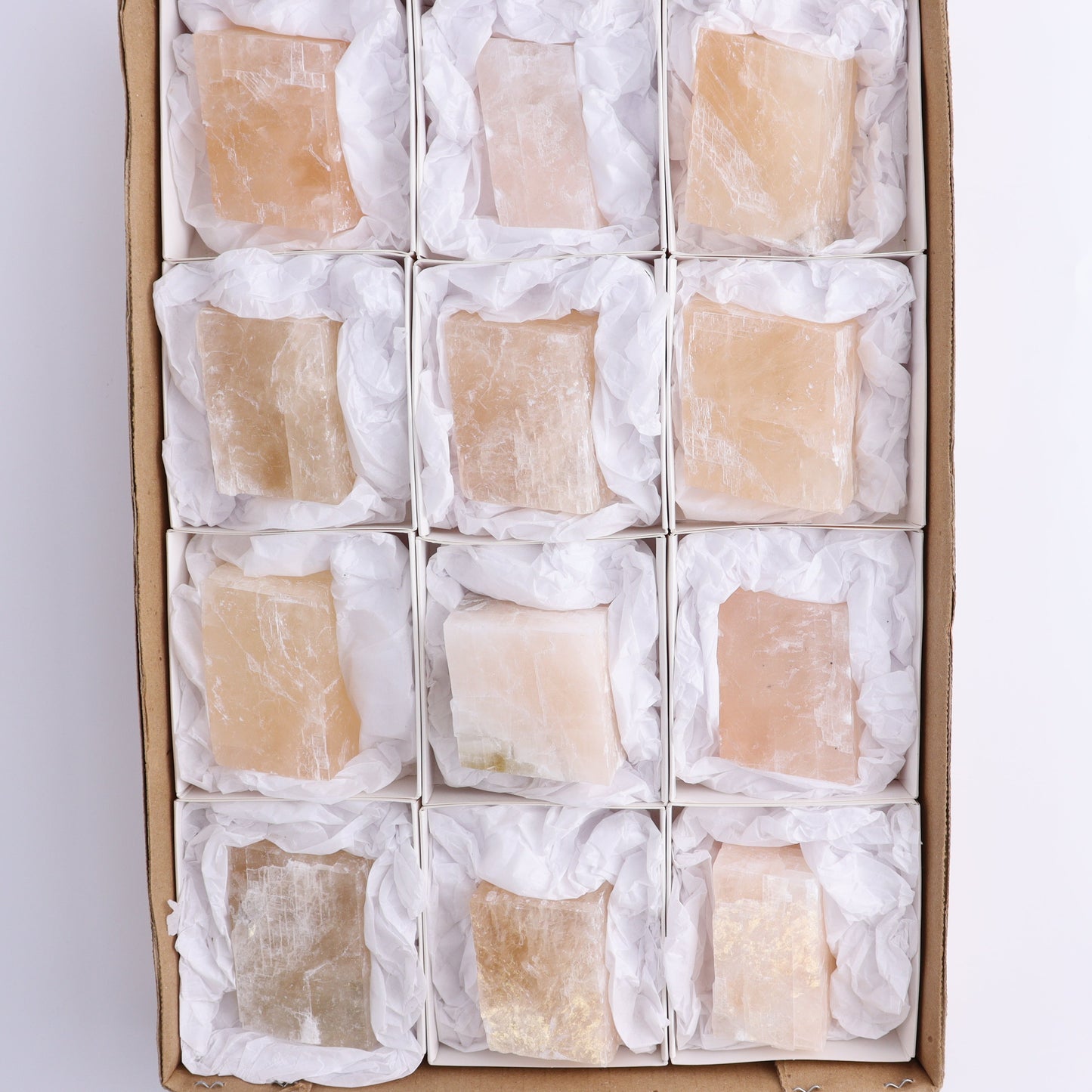 Pink Optical Calcite (Fluorescent) Set of 12 - Expert Wholesale and Supplier of Wholesale Crystals & Bulk Gemstones, ["Calcite","Mexico","Optical Calcite"]