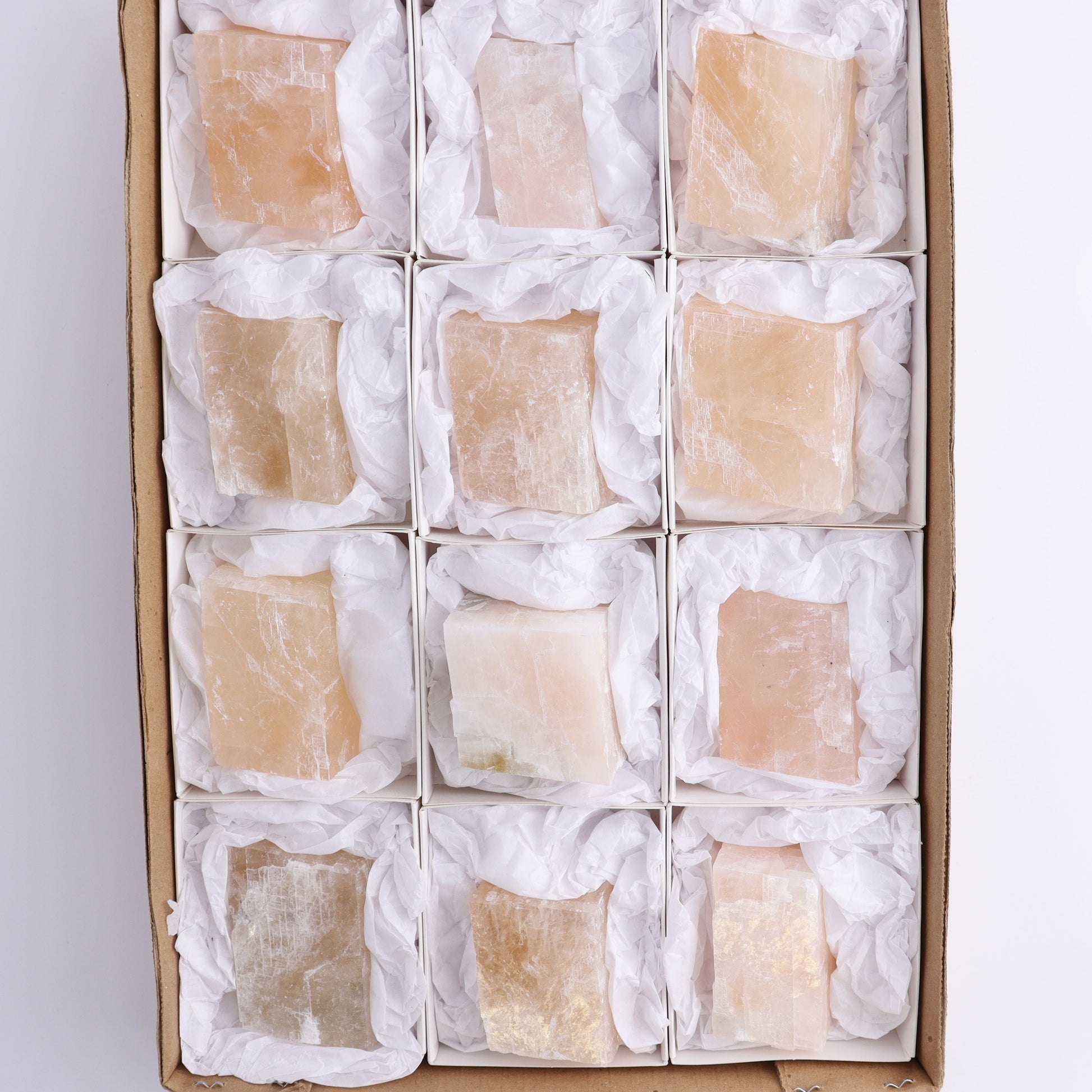 Pink Optical Calcite (Fluorescent) Set of 12 - Expert Wholesale and Supplier of Wholesale Crystals & Bulk Gemstones, ["Calcite","Mexico","Optical Calcite"]