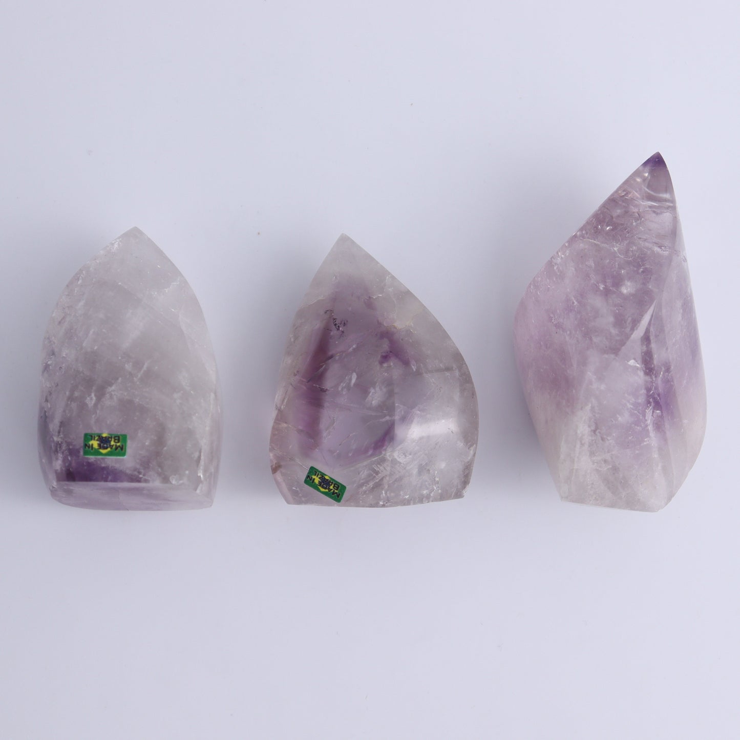 Imperfect Amethyst Flames Set of 9 - Expert Wholesale and Supplier of Wholesale Crystals & Bulk Gemstones, ["Amethyst","Brazil","flames"]
