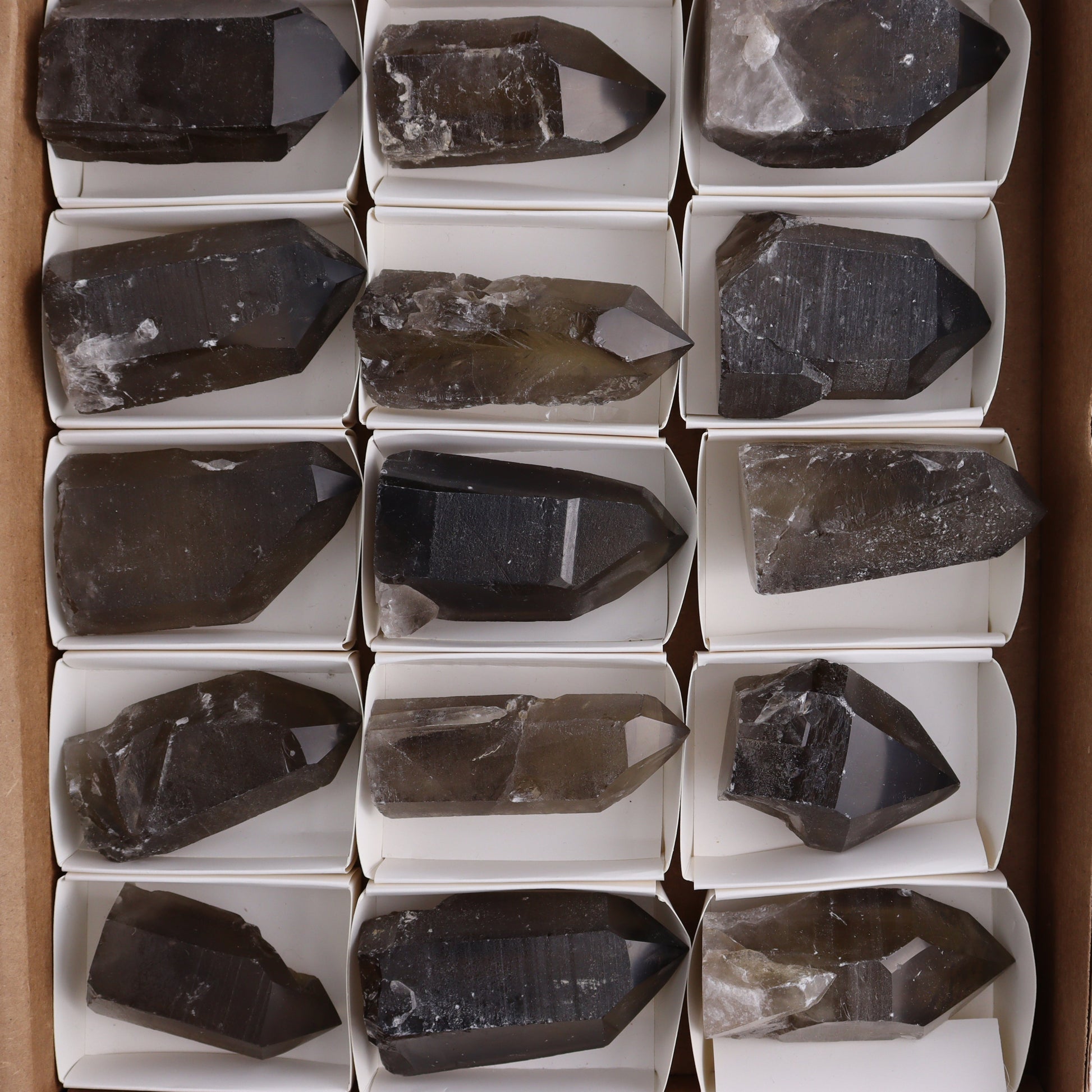 Smoky Quartz Polished Tops Set of 18 - Expert Wholesale and Supplier of Wholesale Crystals & Bulk Gemstones, ["Brazil","close_70","Points","Quartz","Smoky Quartz"]