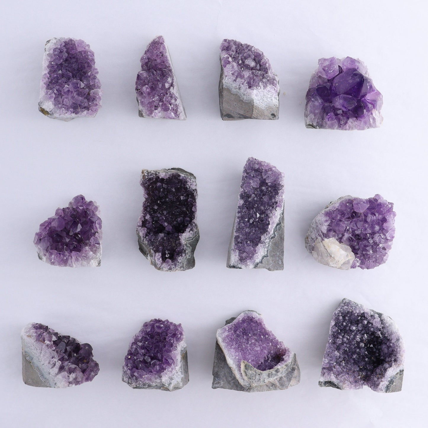 Uruguay Amethyst Cut Base Set of 12 - Expert Wholesale and Supplier of Wholesale Crystals & Bulk Gemstones, ["Amethyst","Cut Base","Uruguay"]