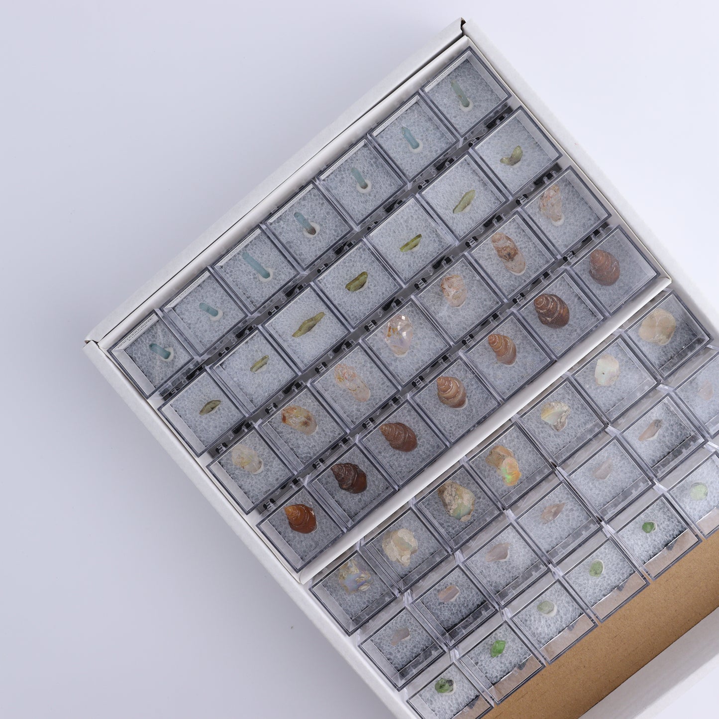 Mixed Mineral Thumbnails Flat - Expert Wholesale and Supplier of Wholesale Crystals & Bulk Gemstones, ["Agate Shells","Aquamarine","Chrysoberyl","Diopside","Ethiopia","ethiopian opal","Madagascar","Magnesio-Axinite","Morocco","Petroleum Quartz","Tanzania"]