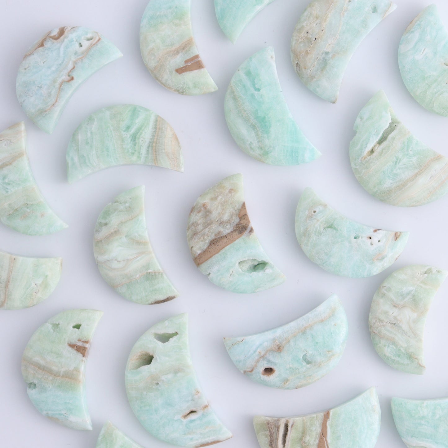 One Caribbean Calcite Little Moon - Expert Wholesale and Supplier of Wholesale Crystals & Bulk Gemstones, ["Calcite","Caribbean Calcite","moons","Pakistan"]