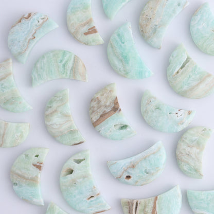 One Caribbean Calcite Little Moon - Expert Wholesale and Supplier of Wholesale Crystals & Bulk Gemstones, ["Calcite","Caribbean Calcite","moons","Pakistan"]