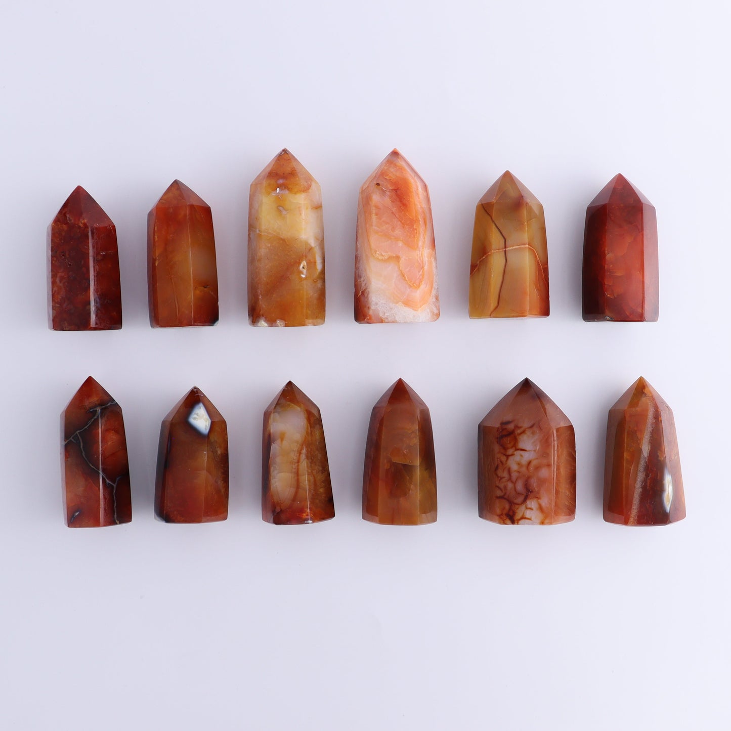 Carnelian Towers Set of 12 - Expert Wholesale and Supplier of Wholesale Crystals & Bulk Gemstones, ["carnelian","Madagascar","Towers"]
