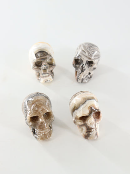 Small Onyx Skulls Set of 4 - Expert Wholesale and Supplier of Wholesale Crystals & Bulk Gemstones, []