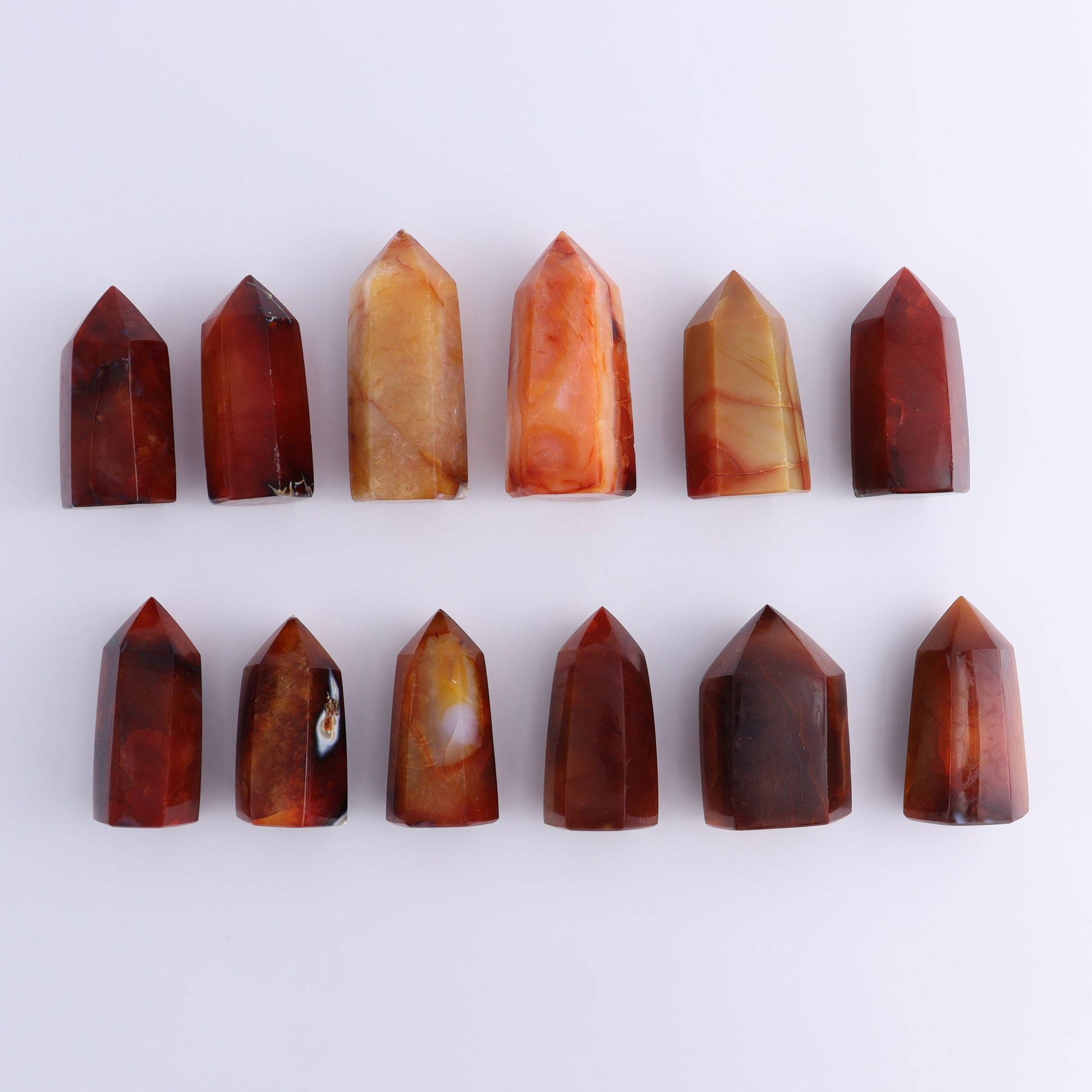 Carnelian Towers Set of 12 - Expert Wholesale and Supplier of Wholesale Crystals & Bulk Gemstones, ["carnelian","Madagascar","Towers"]