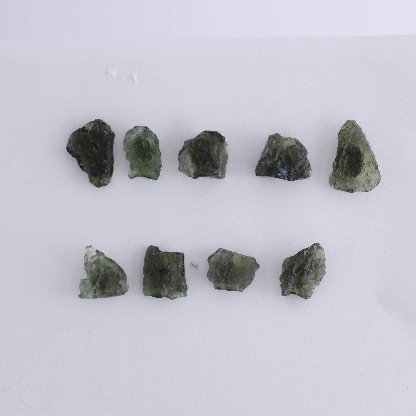 Moldavite Pieces Set of 9 - Expert Wholesale and Supplier of Wholesale Crystals & Bulk Gemstones, ["Czech Republic","Moldavite","Pieces"]