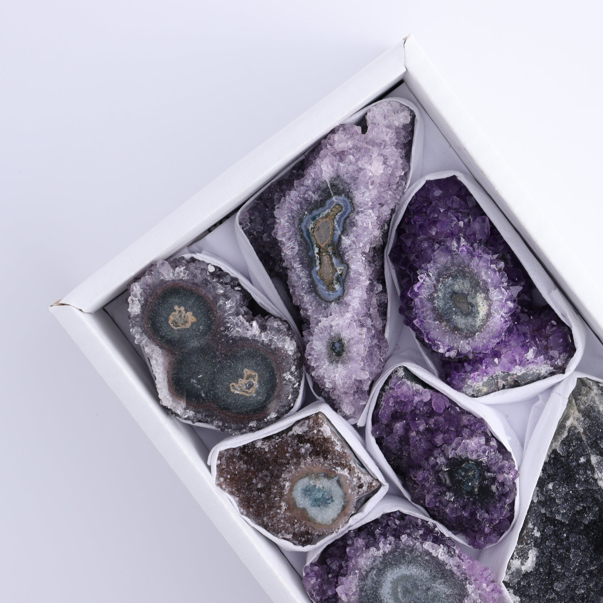 Uruguay Amethyst Clusters with "Eyes" Flat of 8 - Expert Wholesale and Supplier of Wholesale Crystals & Bulk Gemstones, []