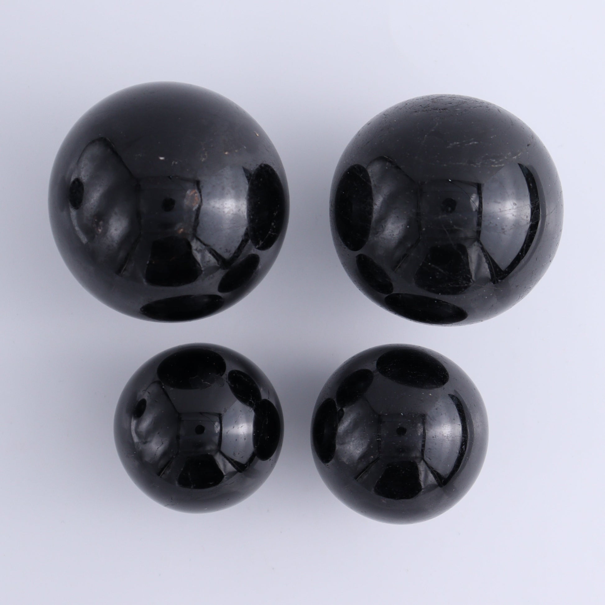 Black Tourmaline Spheres Set of 6 - Expert Wholesale and Supplier of Wholesale Crystals & Bulk Gemstones, ["Black Tourmaline","Spheres","Tourmaline"]