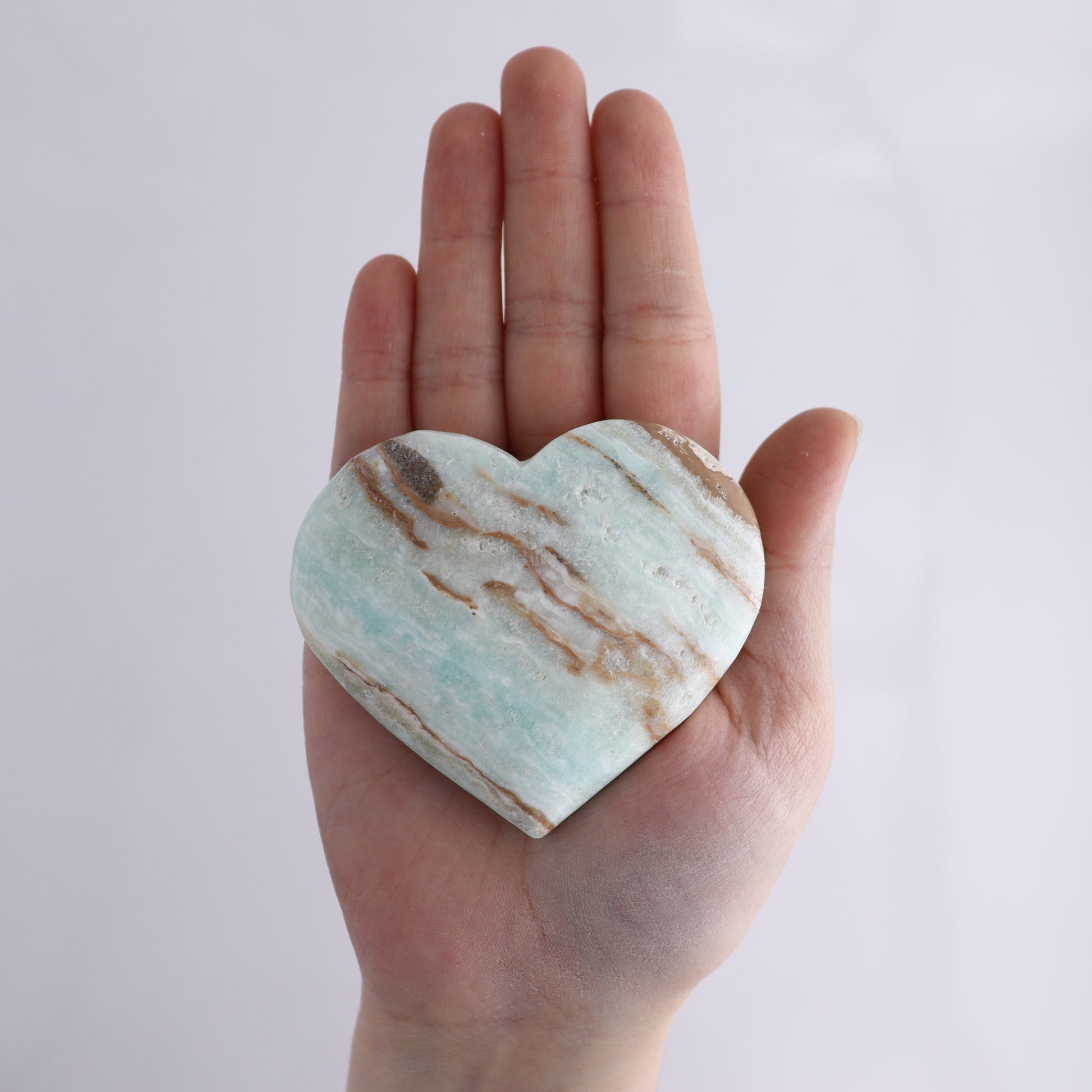 Caribbean Calcite Hearts Flat of 9 - Expert Wholesale and Supplier of Wholesale Crystals & Bulk Gemstones, ["Caribbean Calcite","Hearts","Madagascar"]
