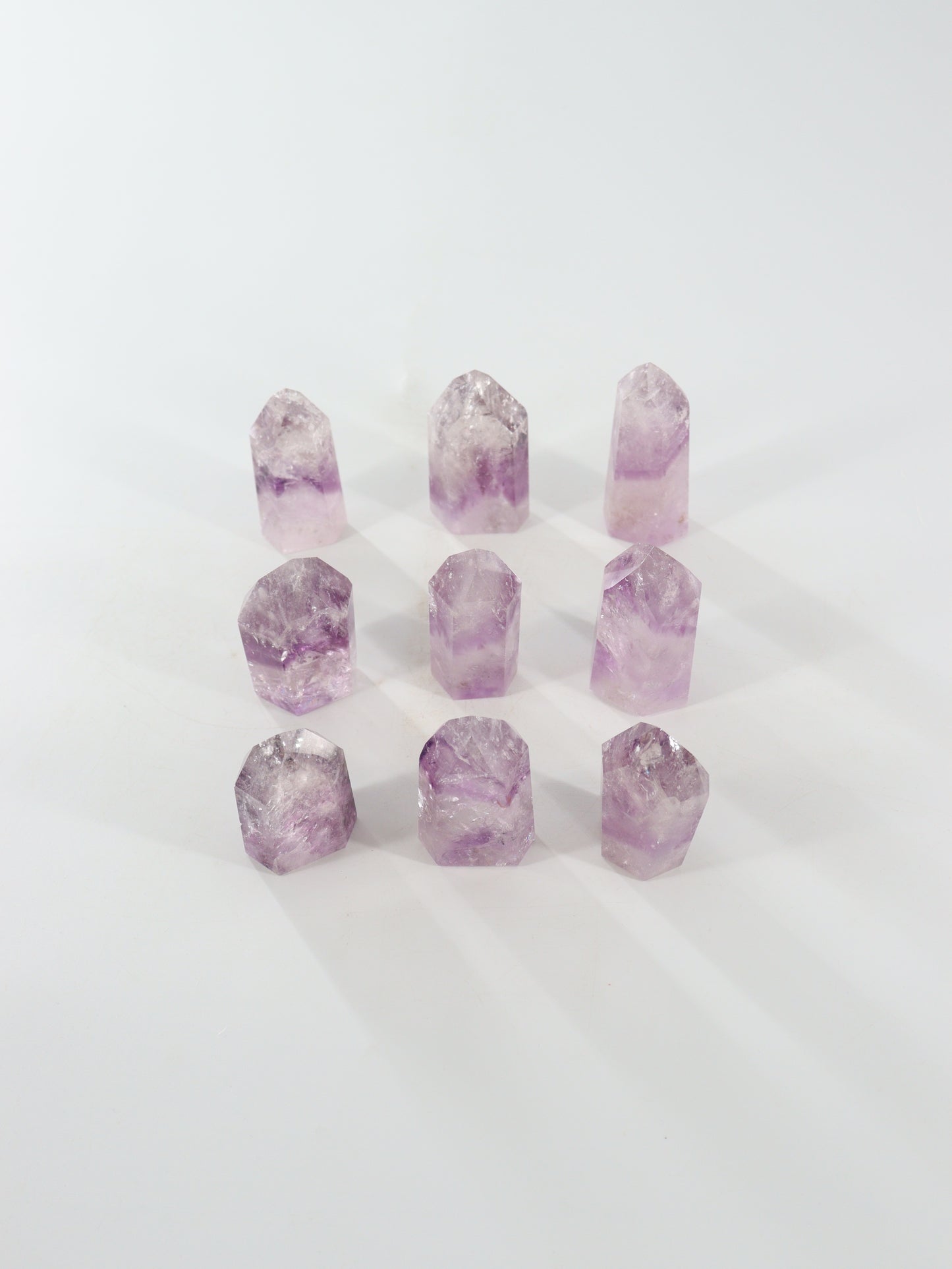 Phantom Amethyst Towers Set of 9 - Expert Wholesale and Supplier of Wholesale Crystals & Bulk Gemstones, []