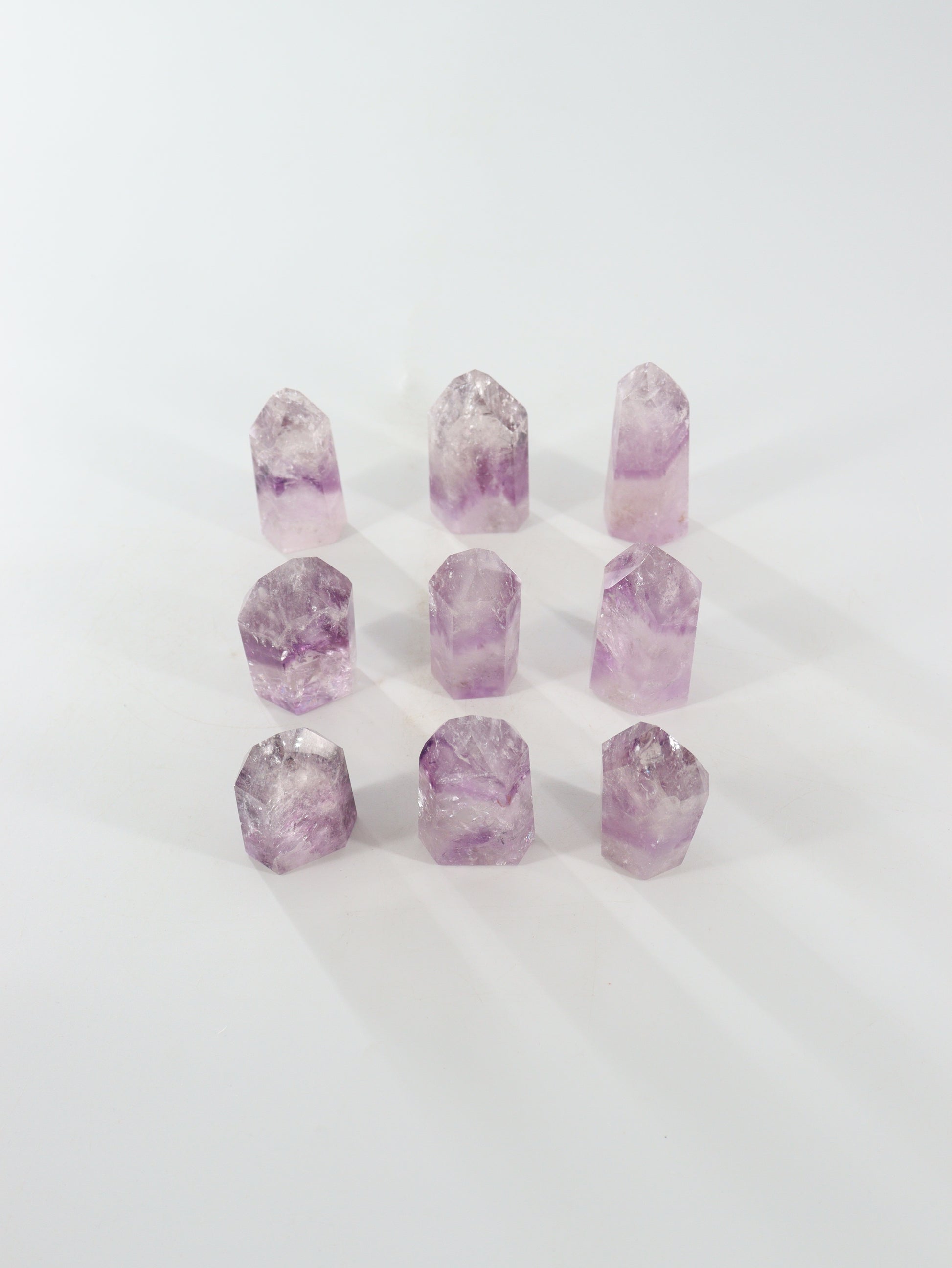 Phantom Amethyst Towers Set of 9 - Expert Wholesale and Supplier of Wholesale Crystals & Bulk Gemstones, []