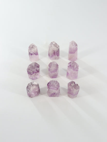 Phantom Amethyst Towers Set of 9 - Expert Wholesale and Supplier of Wholesale Crystals & Bulk Gemstones, []