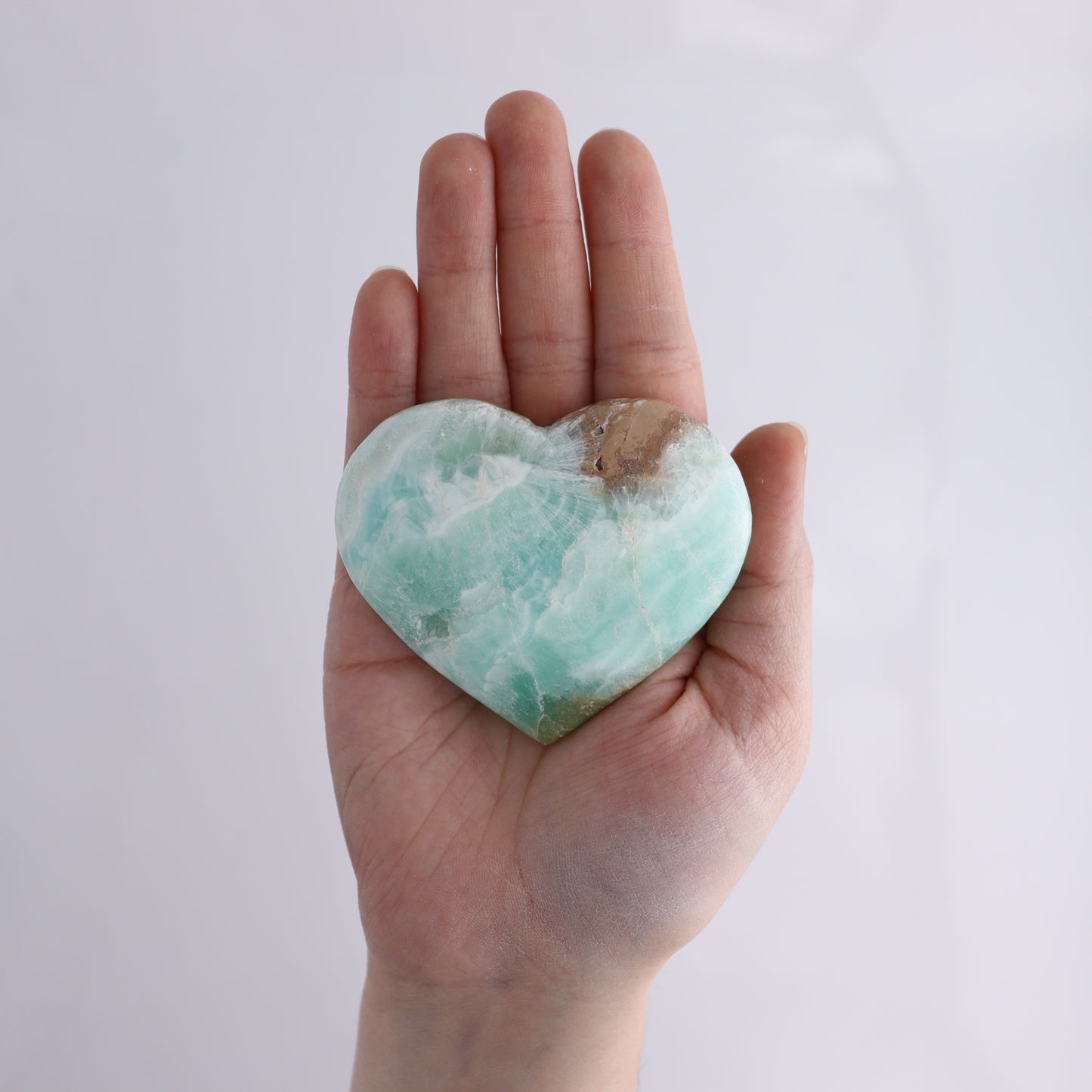 Caribbean Calcite Hearts Flat of 9 - Expert Wholesale and Supplier of Wholesale Crystals & Bulk Gemstones, ["Caribbean Calcite","Hearts","Madagascar"]