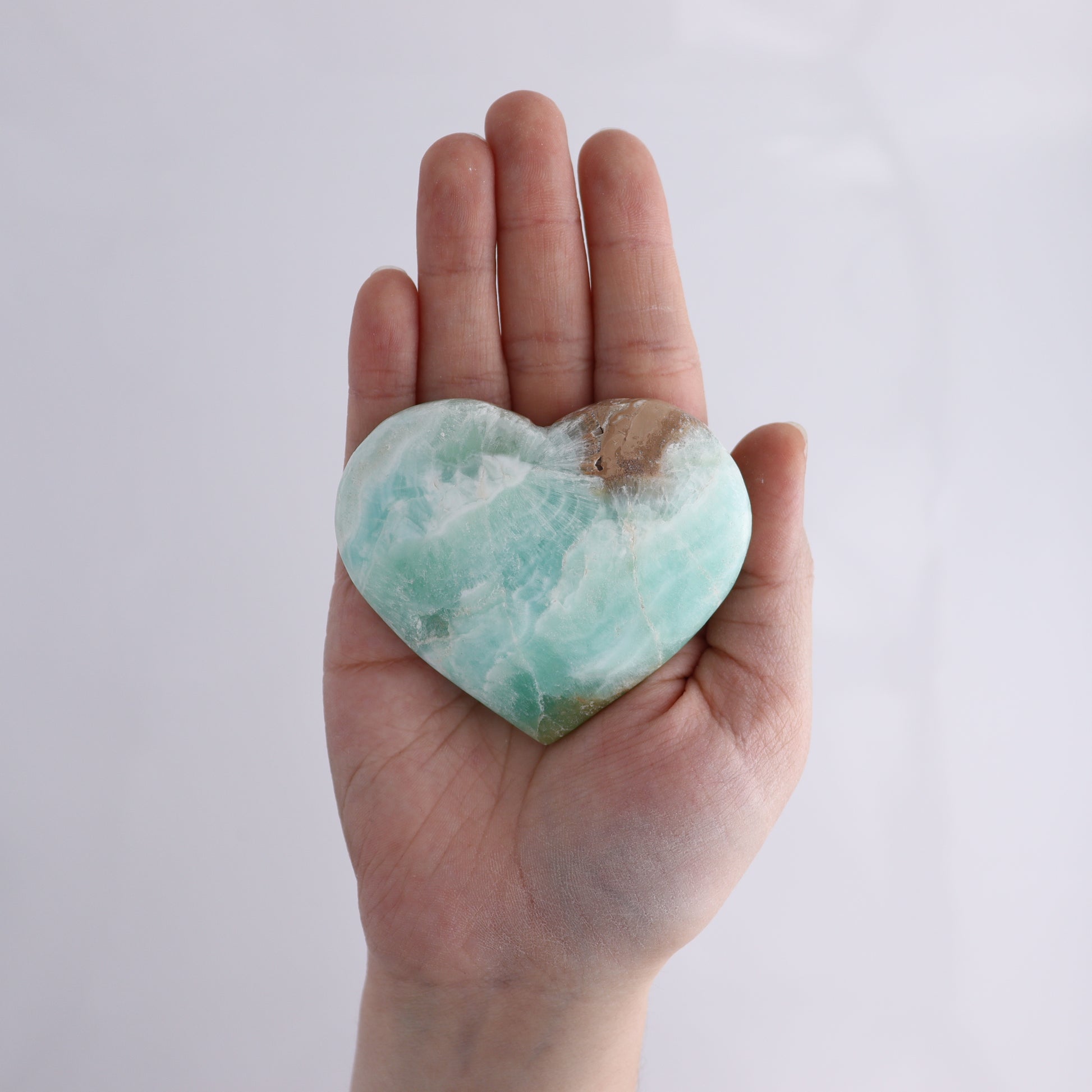 Caribbean Calcite Hearts Flat of 9 - Expert Wholesale and Supplier of Wholesale Crystals & Bulk Gemstones, ["Caribbean Calcite","Hearts","Madagascar"]