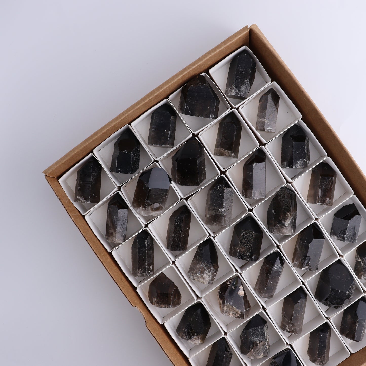 Smoky Quartz Polished Tops Set of 35 - Expert Wholesale and Supplier of Wholesale Crystals & Bulk Gemstones, ["Brazil","close_70","Points","Quartz","Smoky Quartz"]