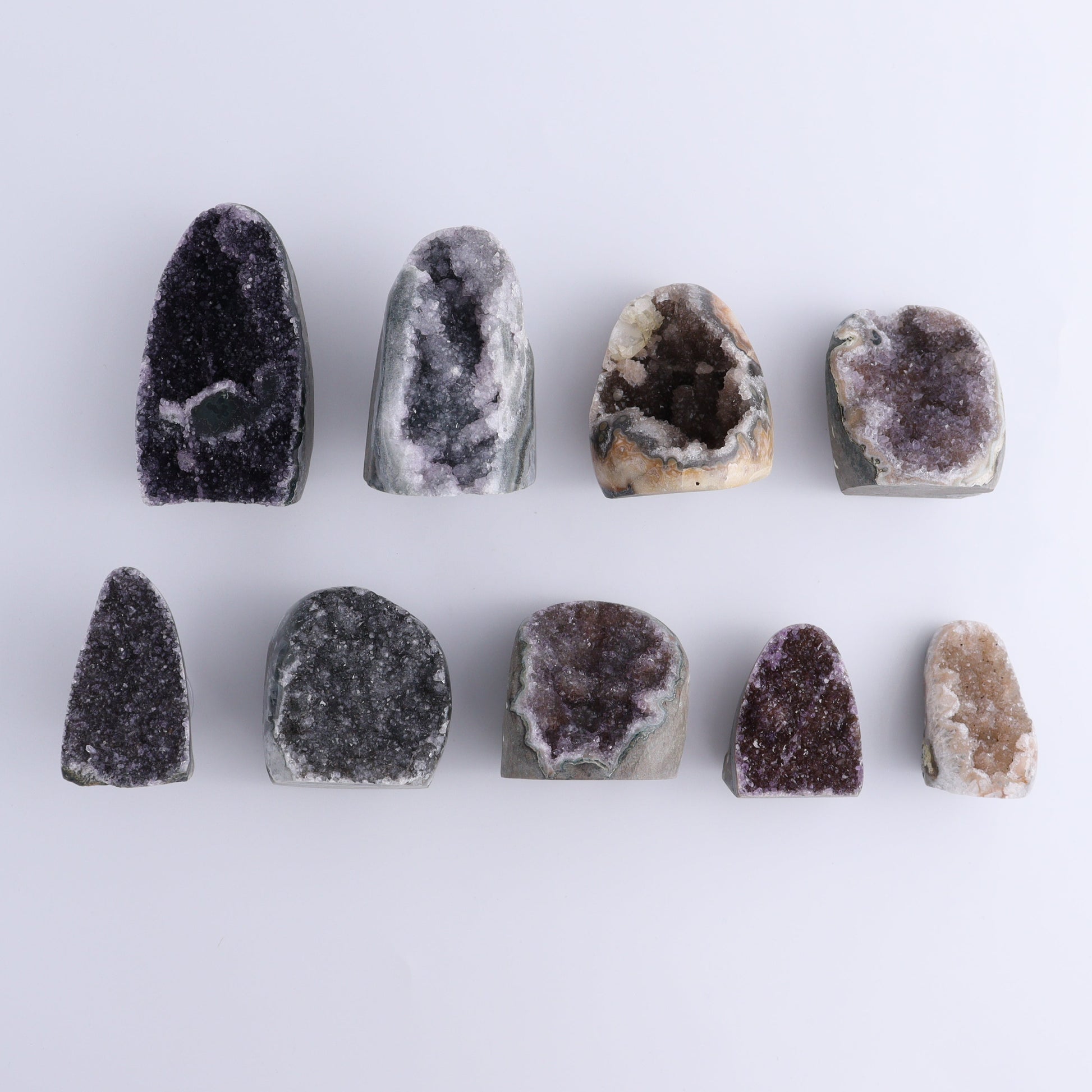 Uruguay Amethyst Cut Base Set of 9 - Expert Wholesale and Supplier of Wholesale Crystals & Bulk Gemstones, ["Amethyst","Cut Base","Uruguay"]