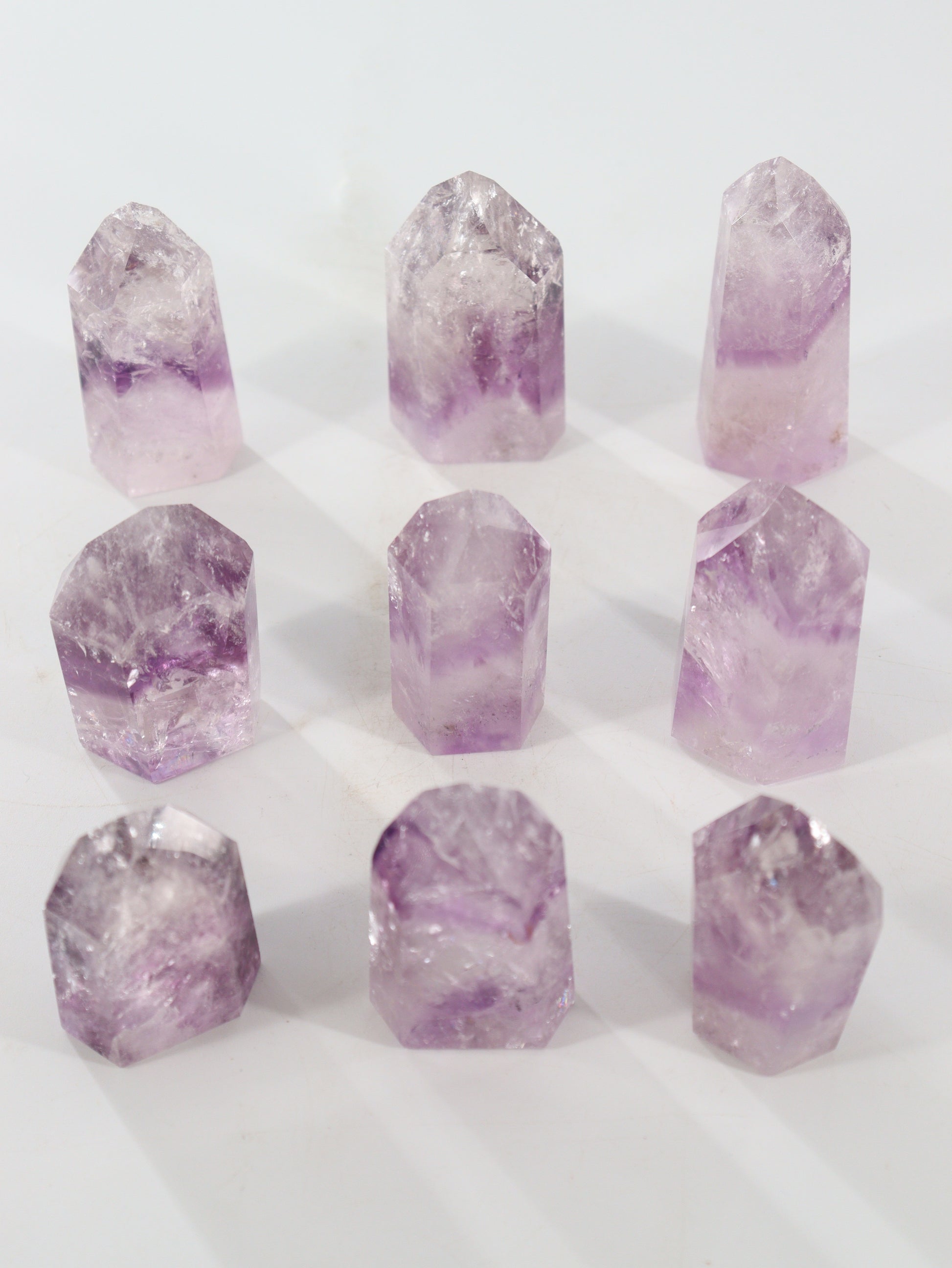Phantom Amethyst Towers Set of 9 - Expert Wholesale and Supplier of Wholesale Crystals & Bulk Gemstones, []