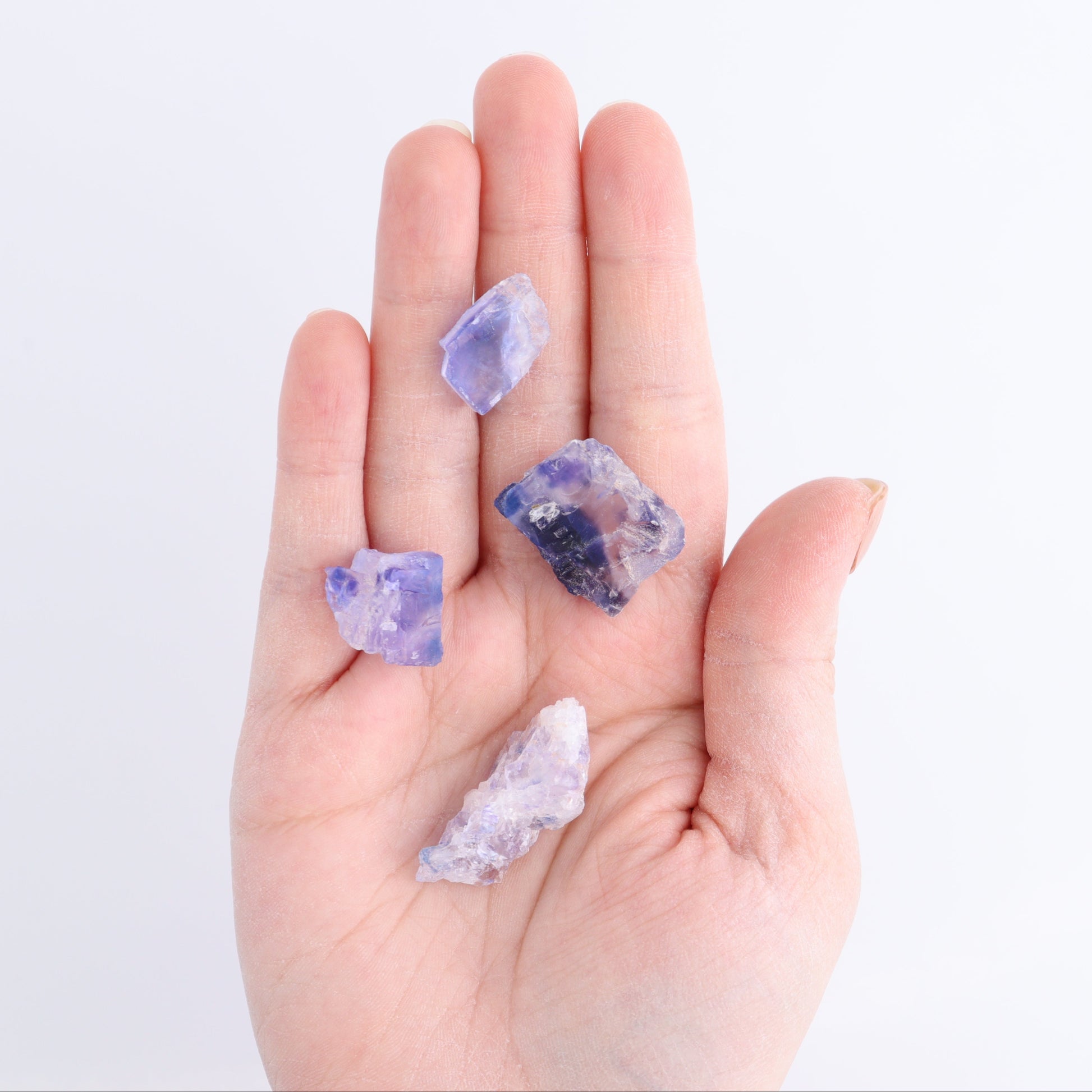 Canadian Blue Halite Rough Set of 9 - Expert Wholesale and Supplier of Wholesale Crystals & Bulk Gemstones, ["Blue Halite","Canada","Halite","Rough","Roughs"]