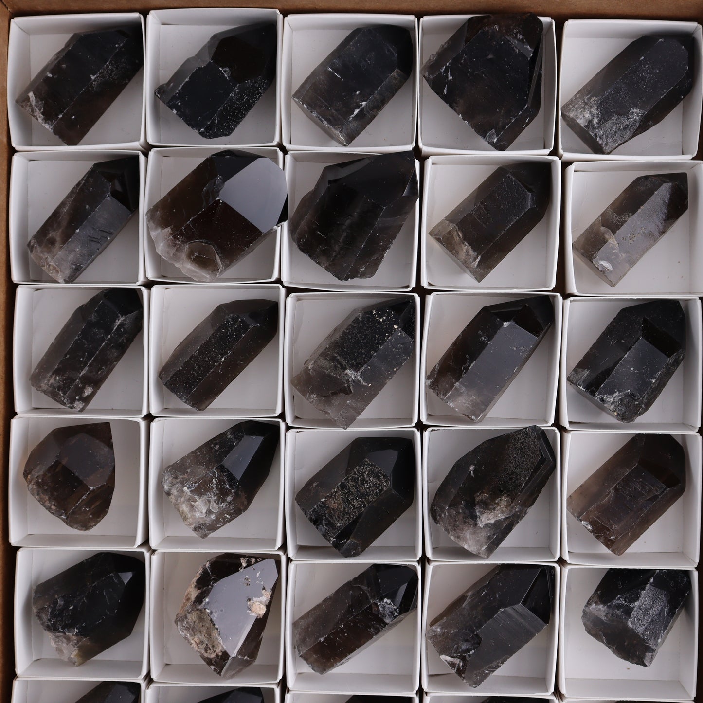 Smoky Quartz Polished Tops Set of 35 - Expert Wholesale and Supplier of Wholesale Crystals & Bulk Gemstones, ["Brazil","close_70","Points","Quartz","Smoky Quartz"]