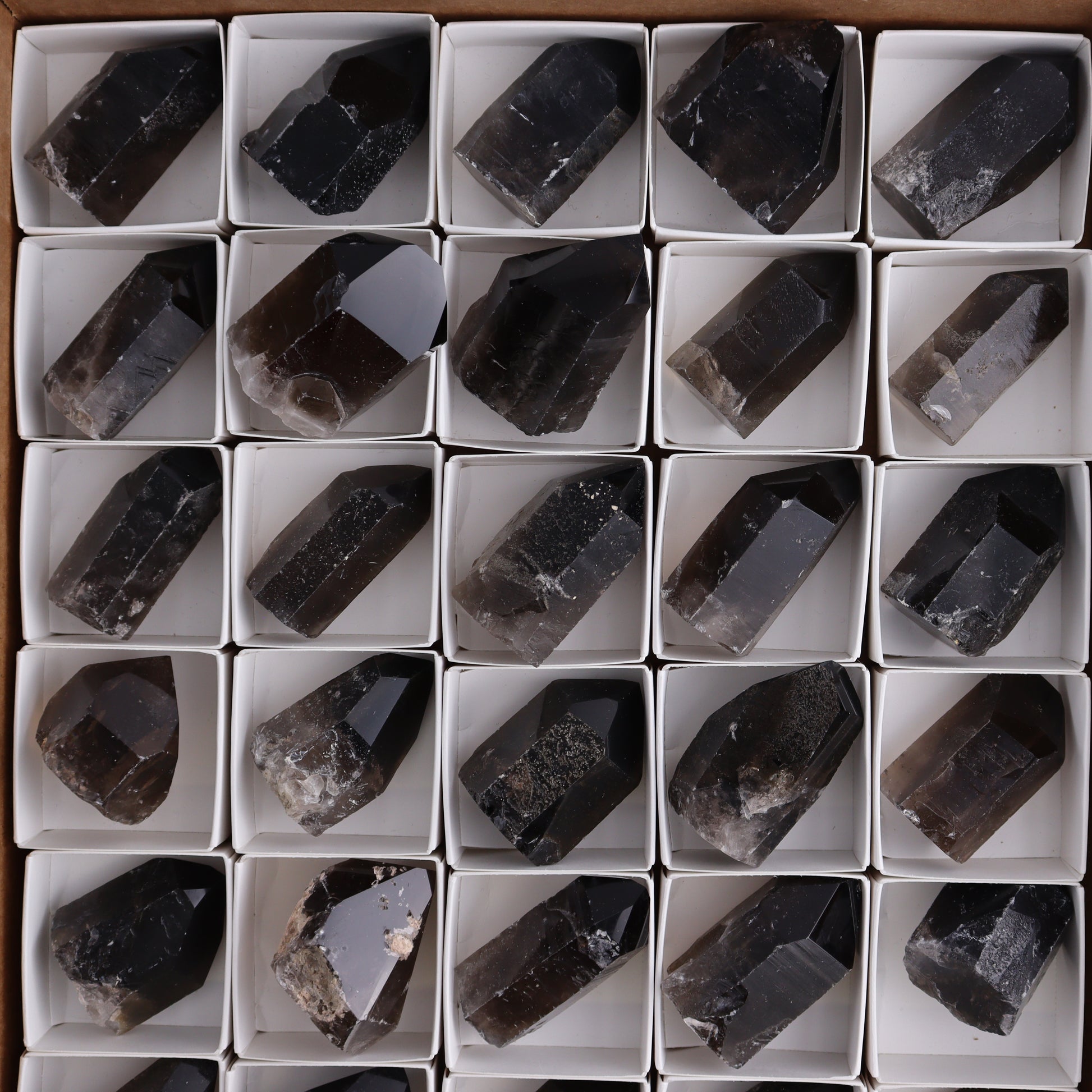 Smoky Quartz Polished Tops Set of 35 - Expert Wholesale and Supplier of Wholesale Crystals & Bulk Gemstones, ["Brazil","close_70","Points","Quartz","Smoky Quartz"]