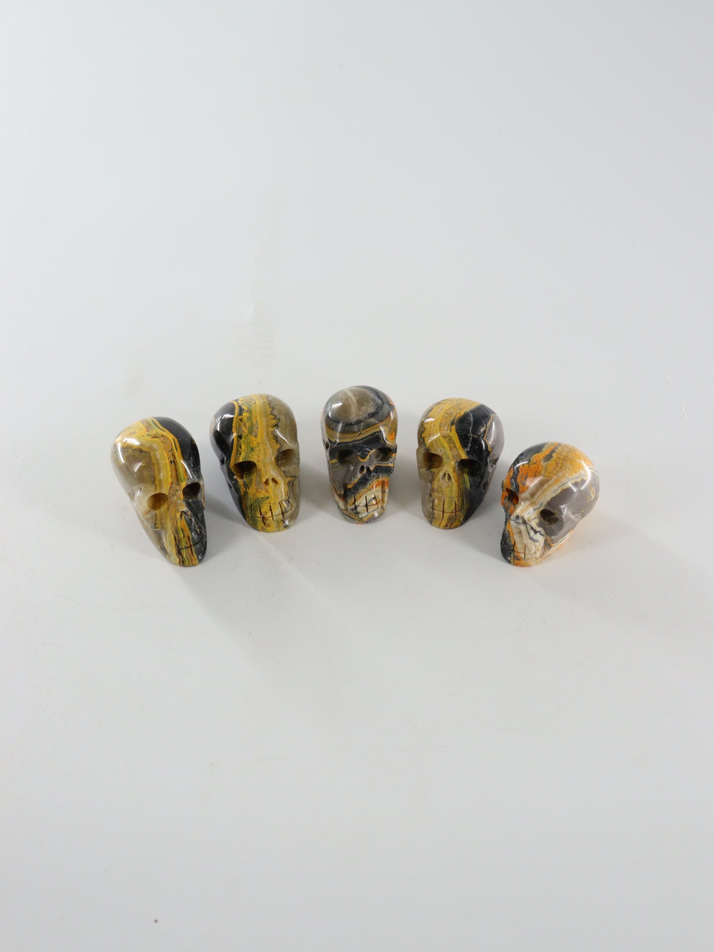 Bumblebee Jasper Skulls Set of 5 - Expert Wholesale and Supplier of Wholesale Crystals & Bulk Gemstones, []