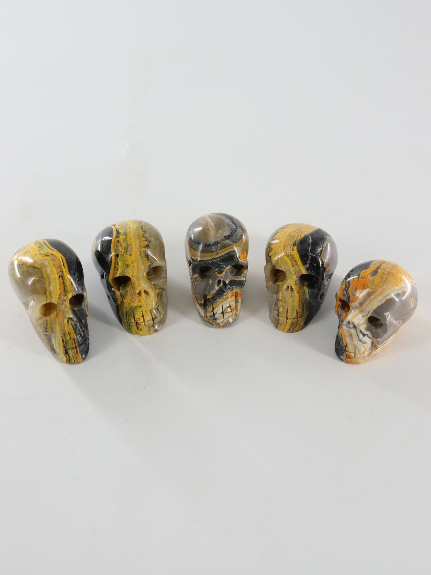 Bumblebee Jasper Skulls Set of 5 - Expert Wholesale and Supplier of Wholesale Crystals & Bulk Gemstones, []