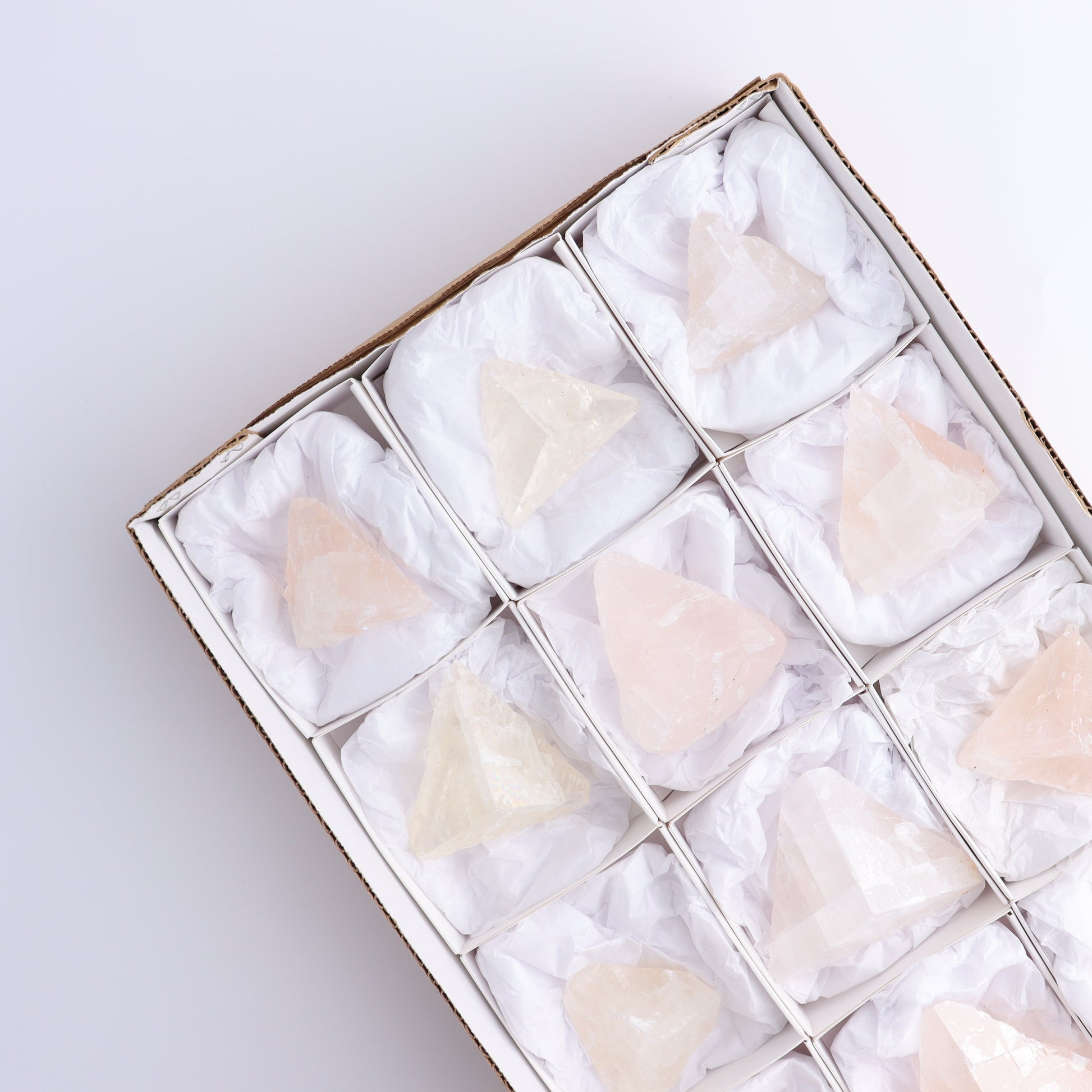 Pink Optical Calcite (Fluorescent) Set of 12 - Expert Wholesale and Supplier of Wholesale Crystals & Bulk Gemstones, ["Calcite","Mexico","Optical Calcite"]